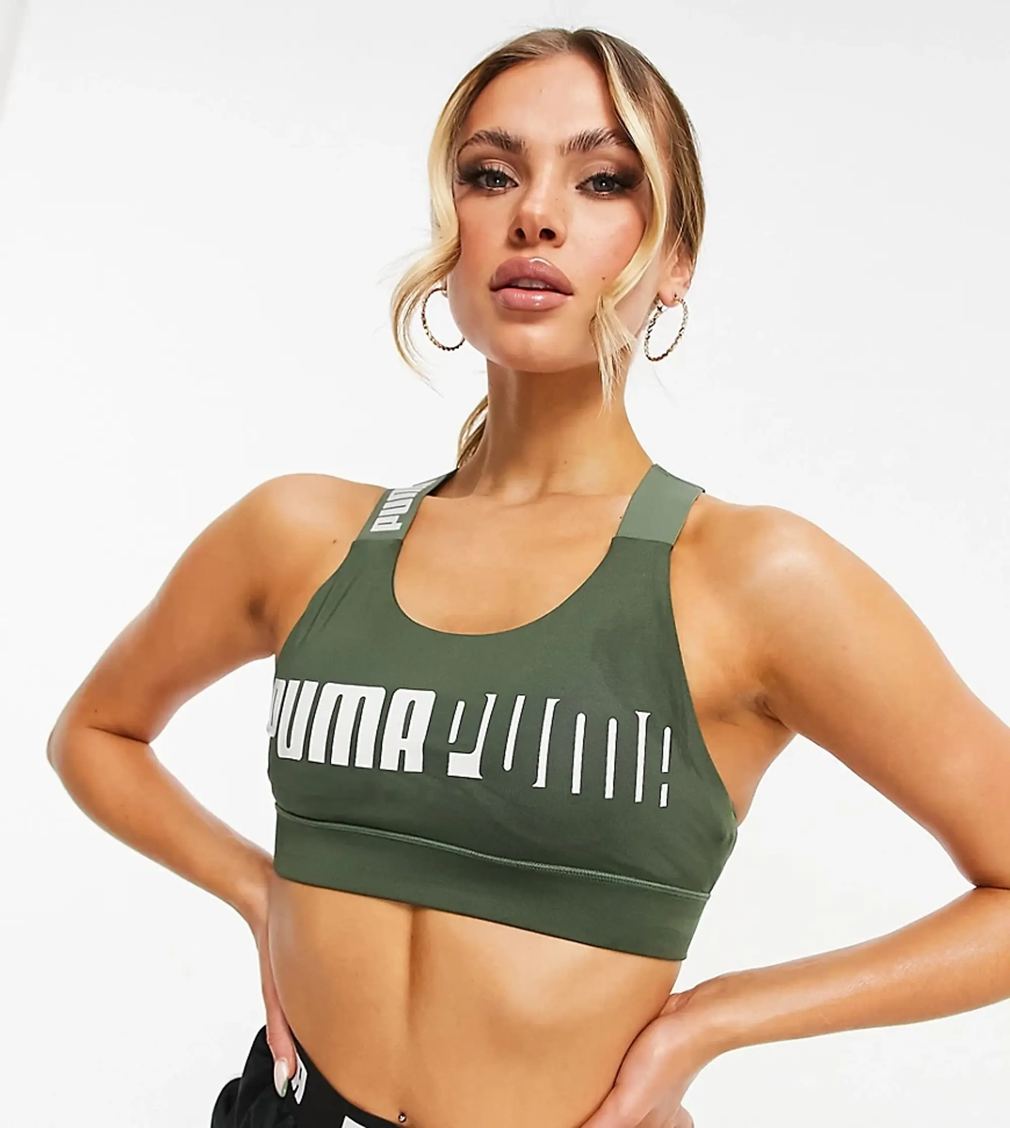 Puma Training logo mid support sports bra in thyme with grey logo exclusive  to ASOS, 521118_65