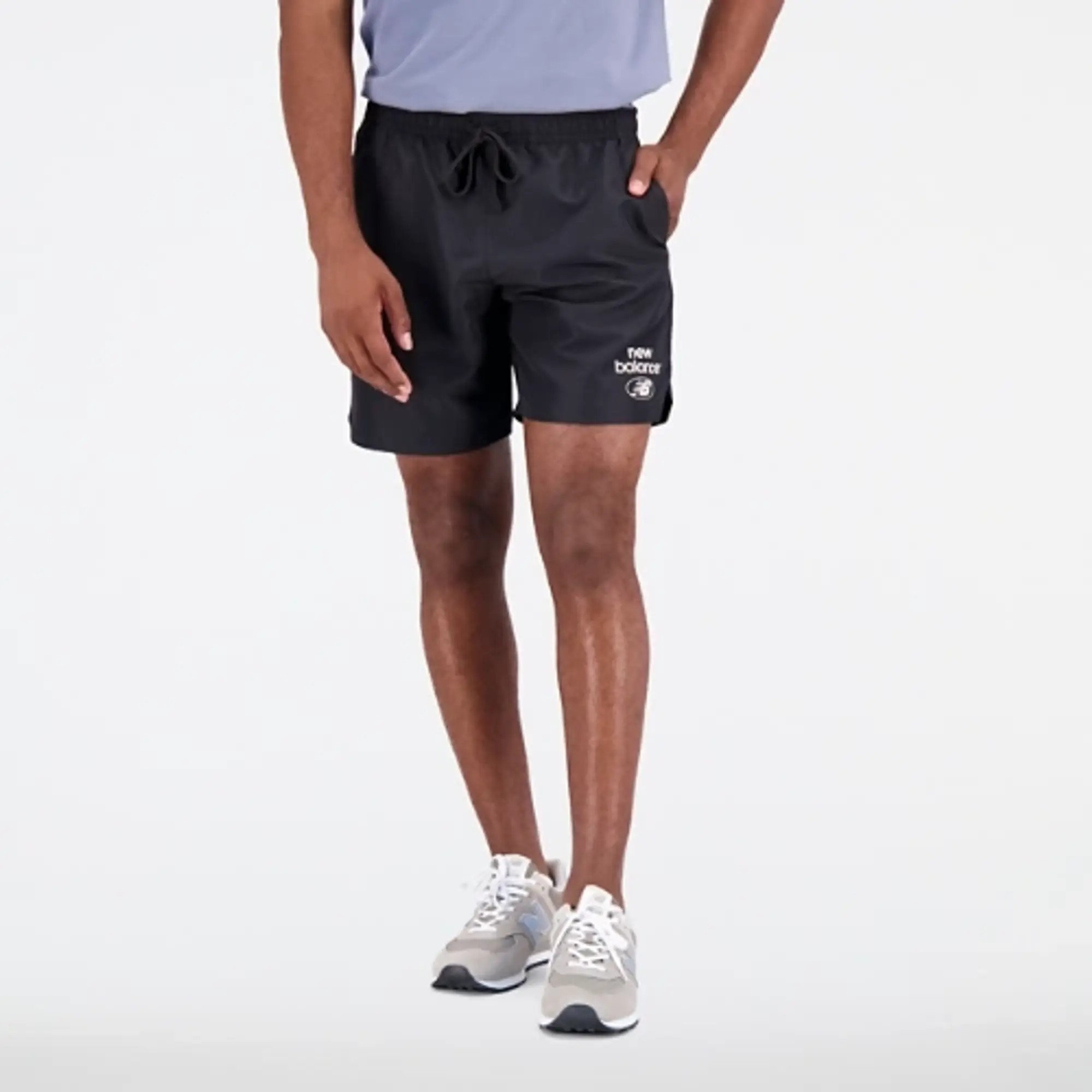 New Balance Men's Essentials Reimagined Woven Short in Black Polywoven