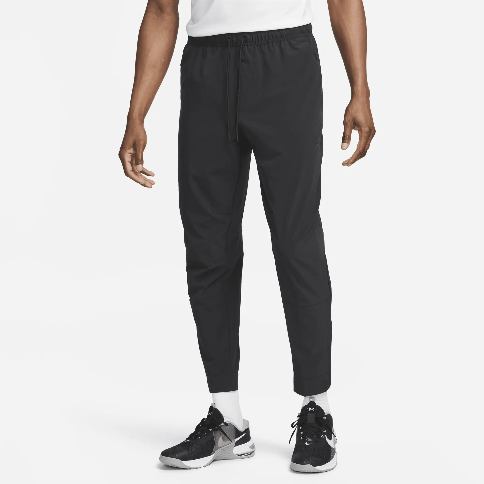 Nike Unlimited Men's Dri-FIT Zip Cuff Versatile Trousers - Black - Polyester/Elastane