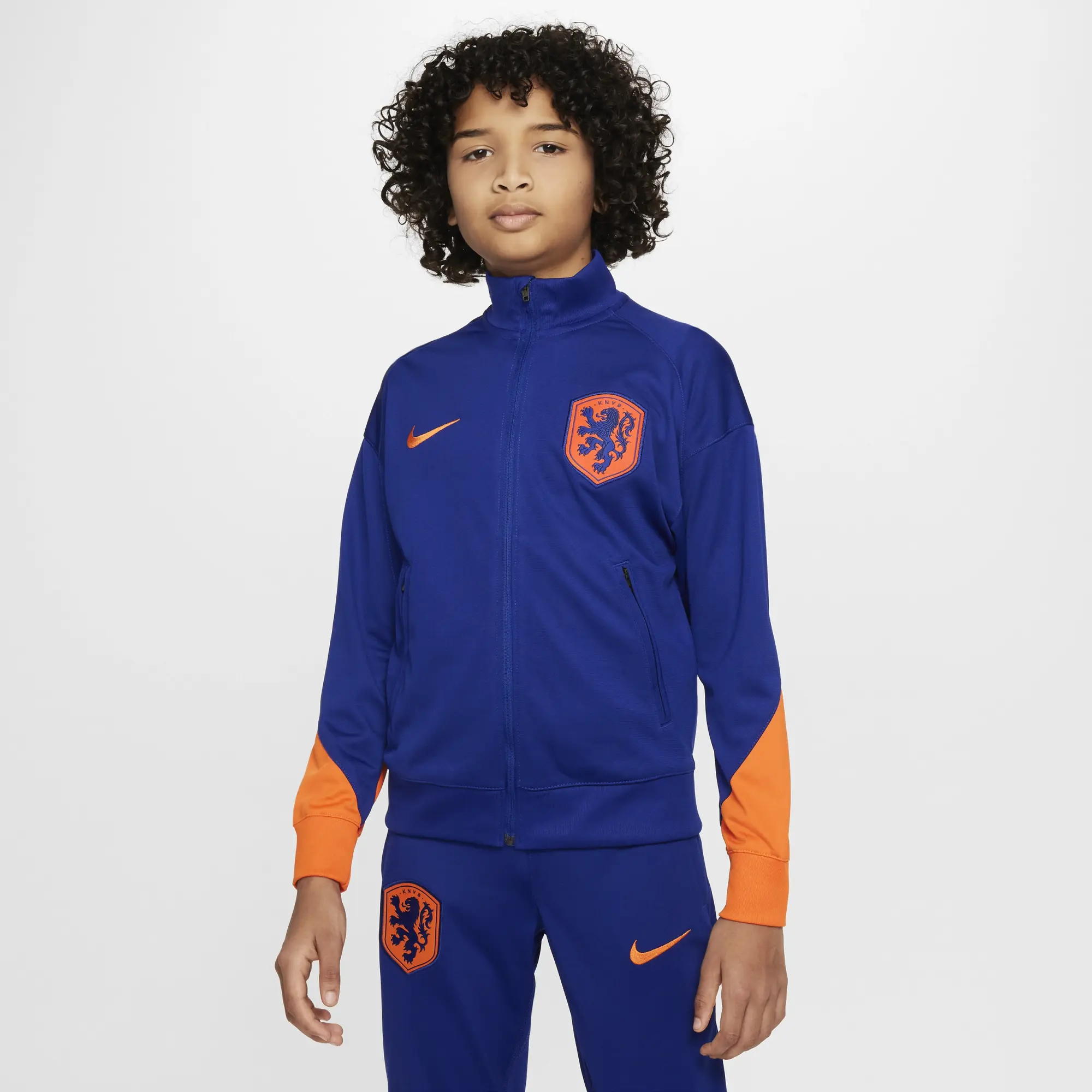 Orange and blue nike tracksuit best sale