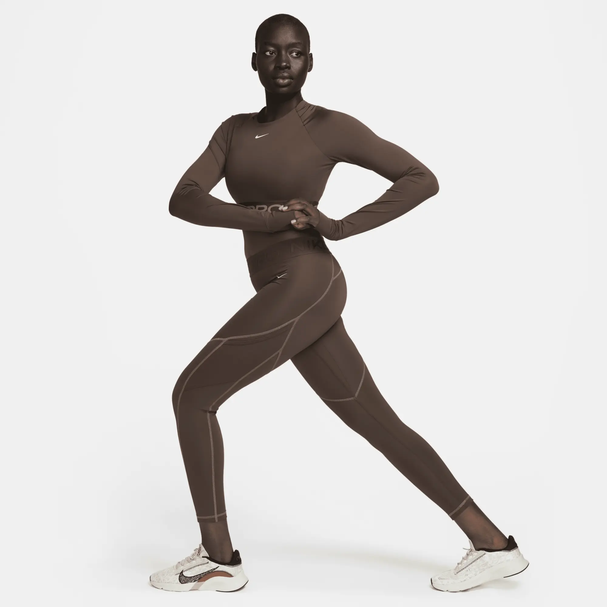 Nike Pro Women's Mid-Rise 7/8 Leggings with Pockets - Brown - Polyester/Elastane