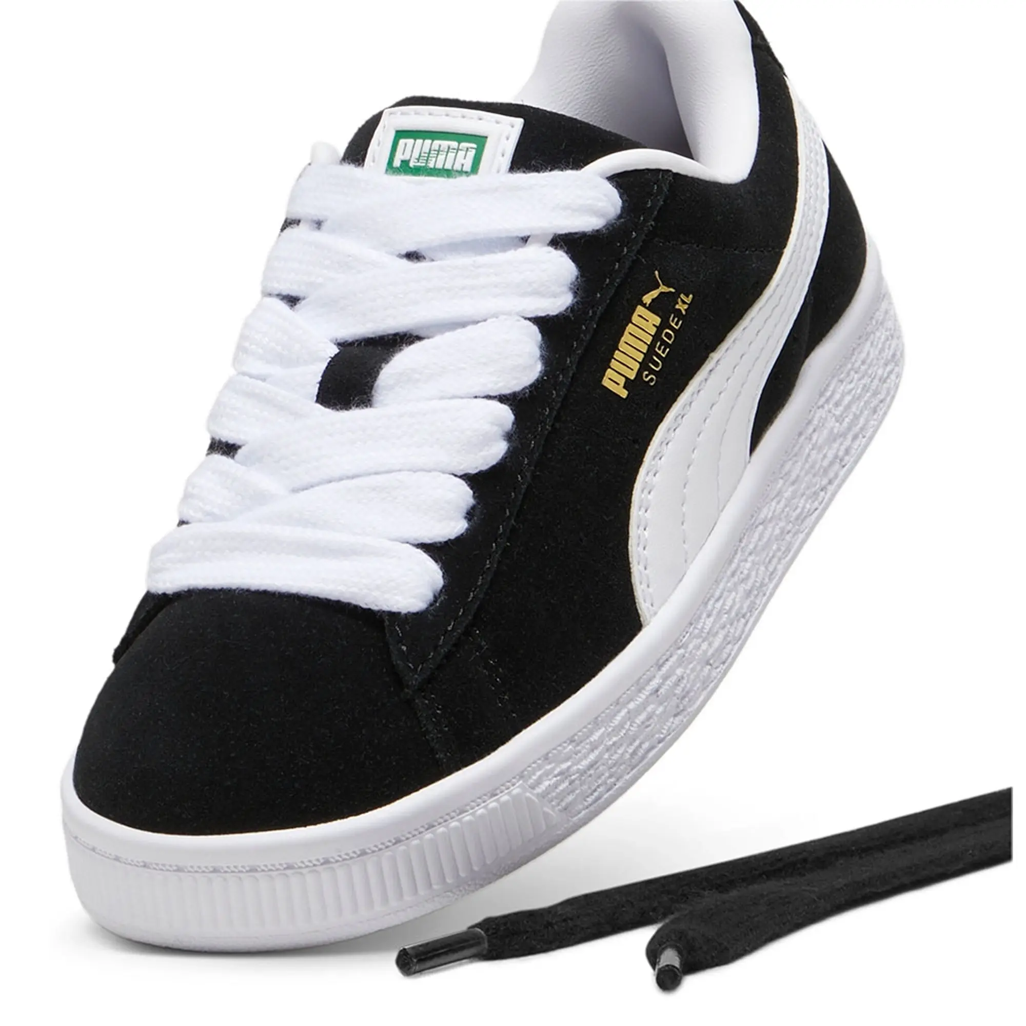 PUMA black & white suede xl Junior trainers