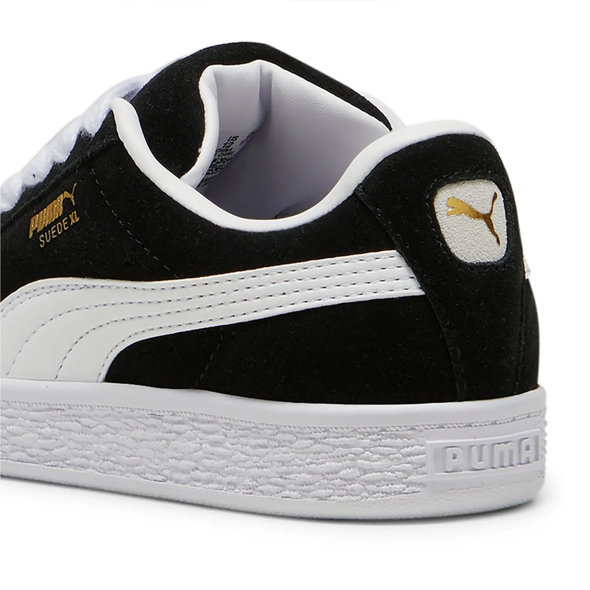 PUMA black & white suede xl Junior trainers