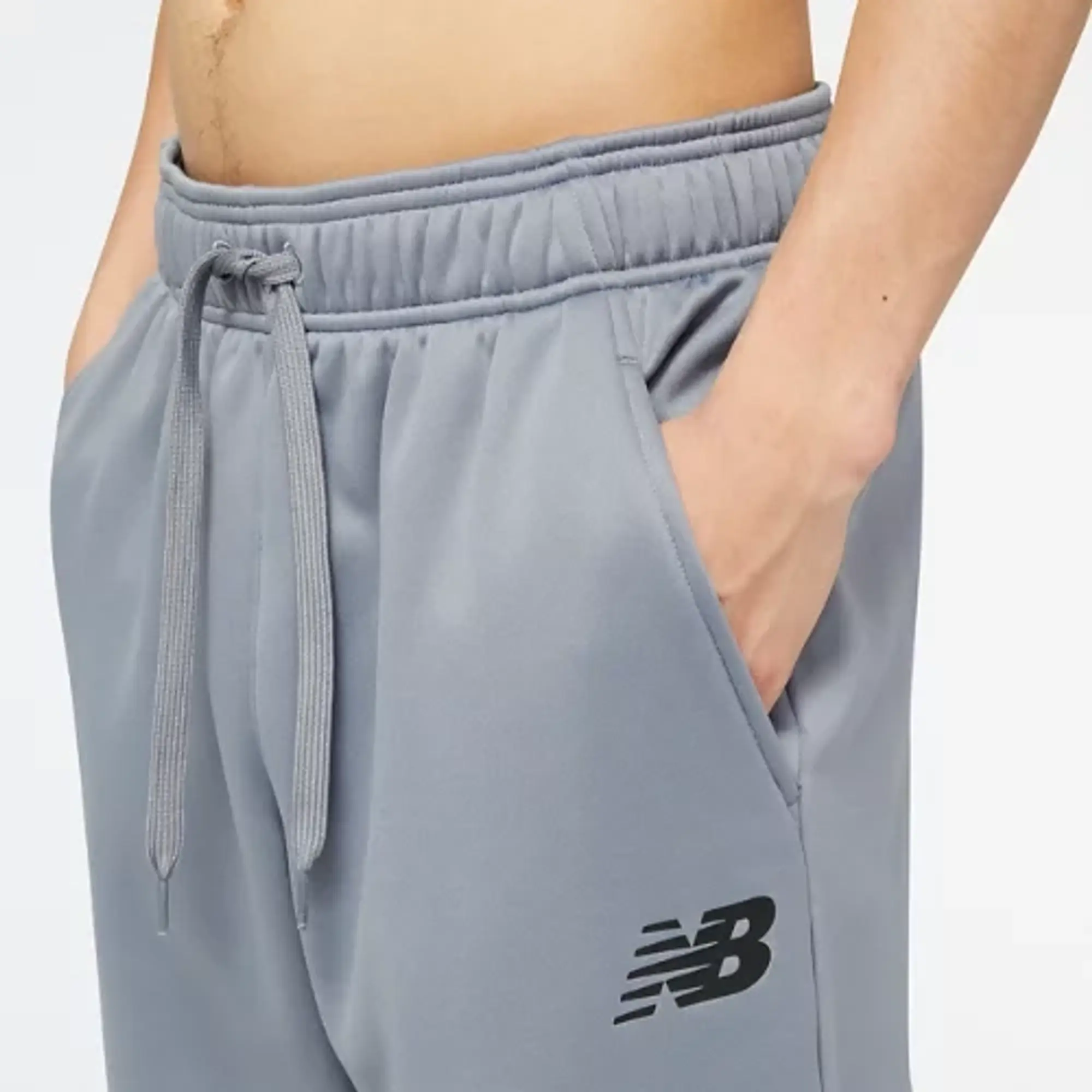 New Balance Men's Tenacity Performance Fleece Pant in Grey Poly Knit