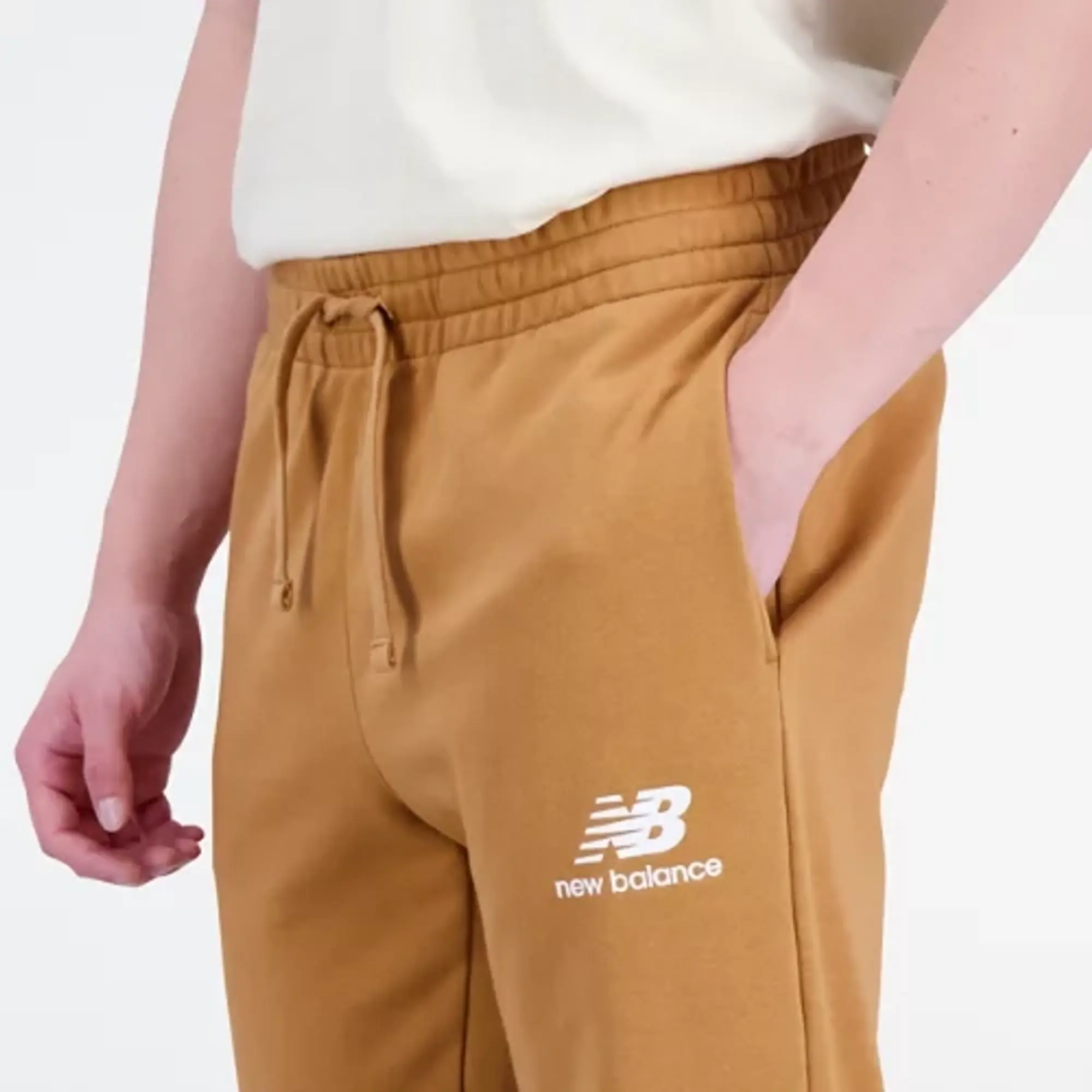 New Balance Men's Essentials Stacked Logo French Terry Sweatpant in Brown Cotton Fleece