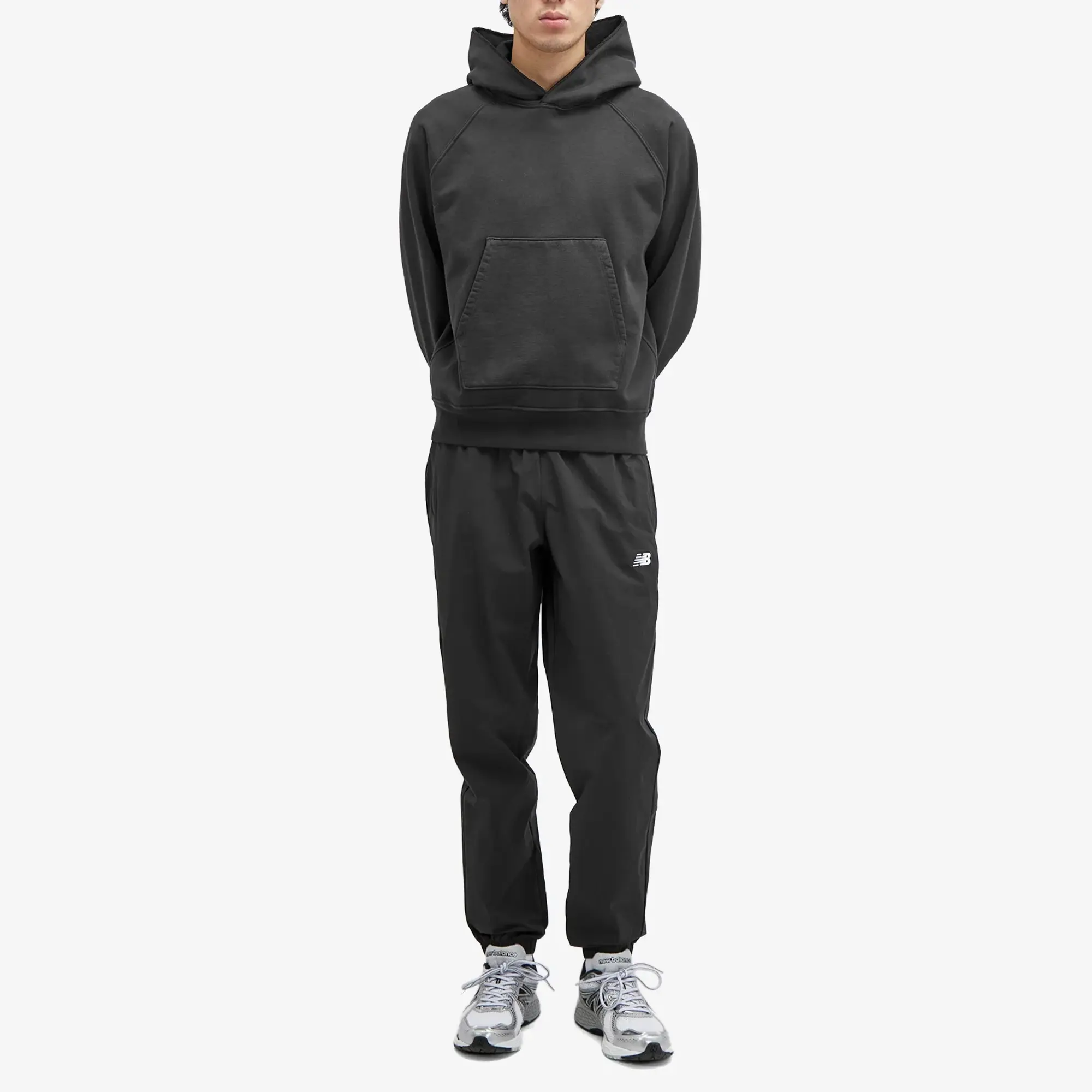 New Balance Men's Athletics Stretch Woven Jogger in Black Nylon Woven