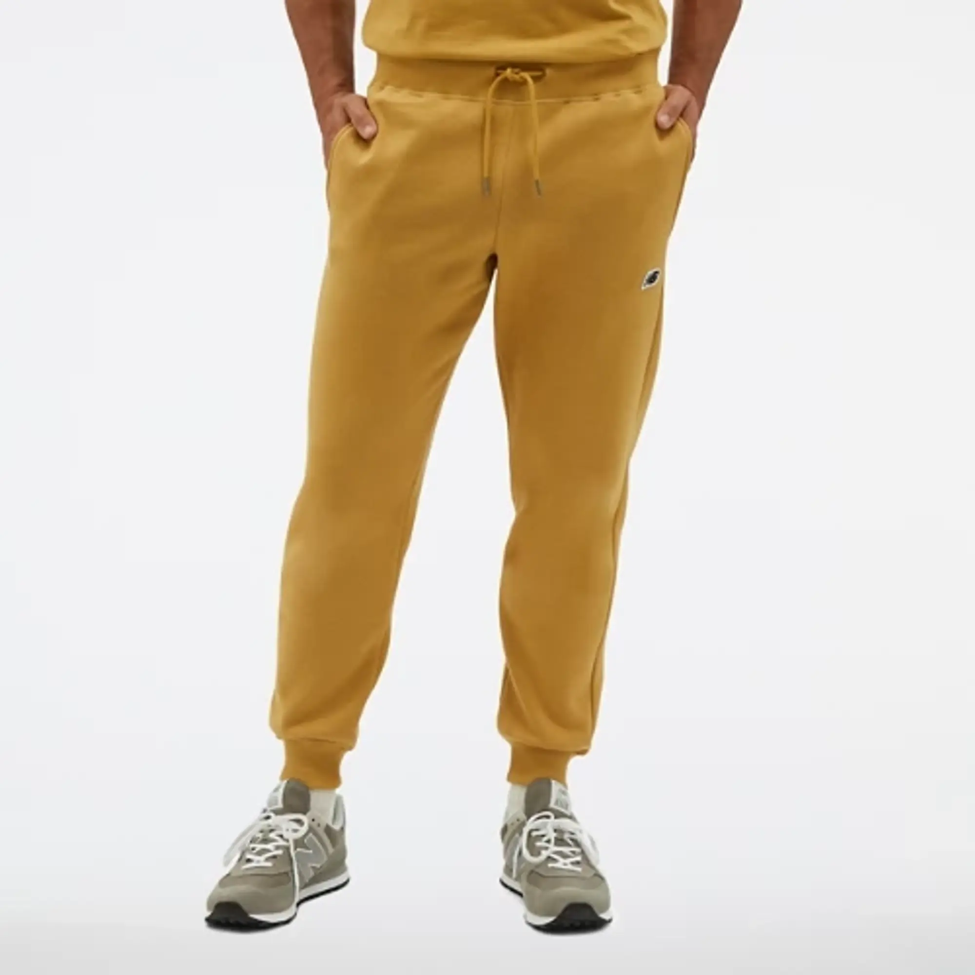 New Balance Men's NB Small Logo Pants in Yellow Cotton