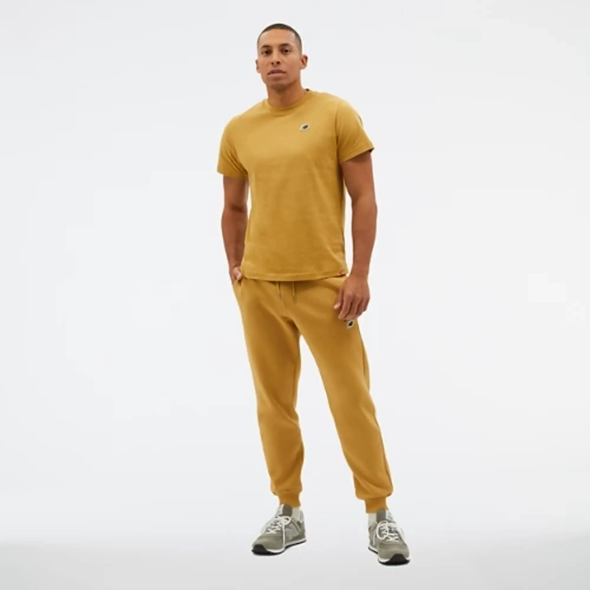 New Balance Men's NB Small Logo Pants in Yellow Cotton