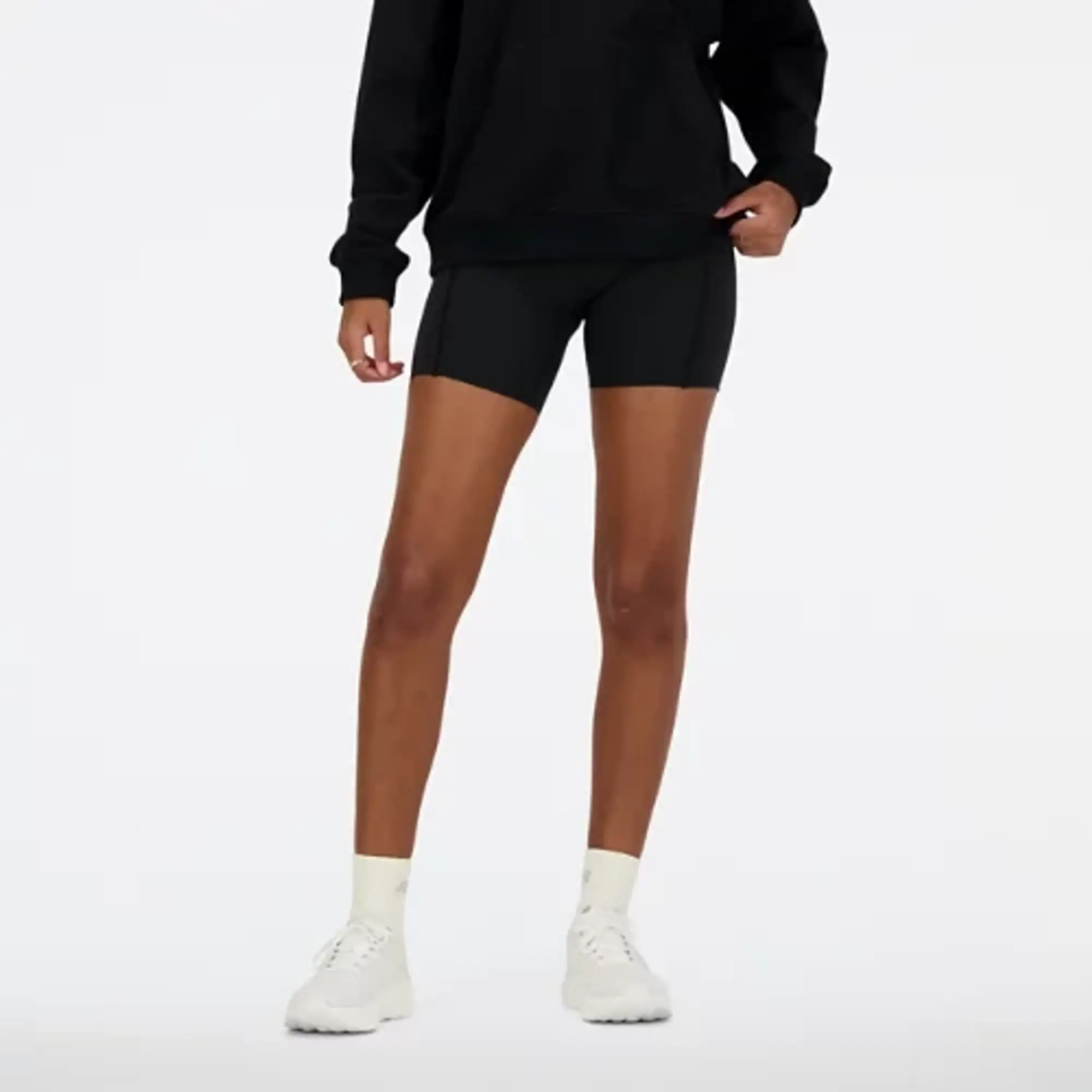 New Balance Women's NB Sleek Pocket High Rise Short 6 in Black Poly Knit