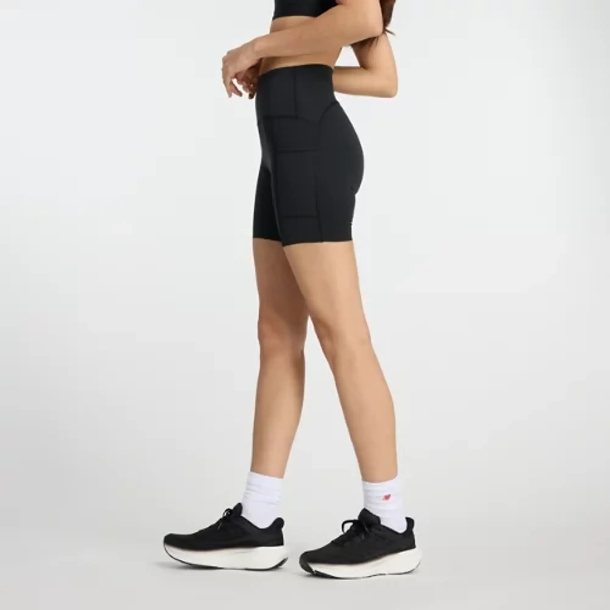 New Balance Women's NB Sleek Pocket High Rise Short 6 in Black Poly Knit