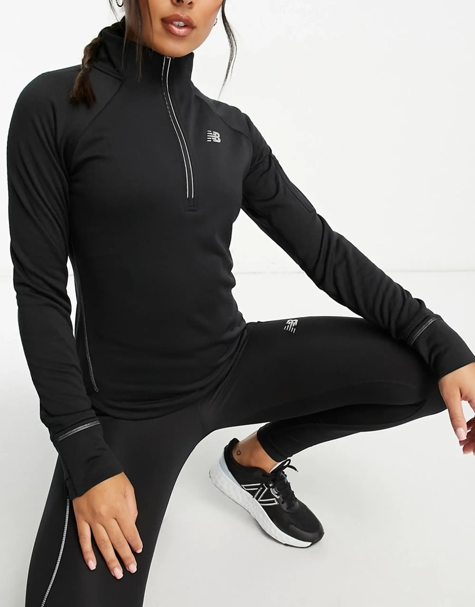 New Balance Women's NB Heat Grid Half Zip in Black Poly Knit