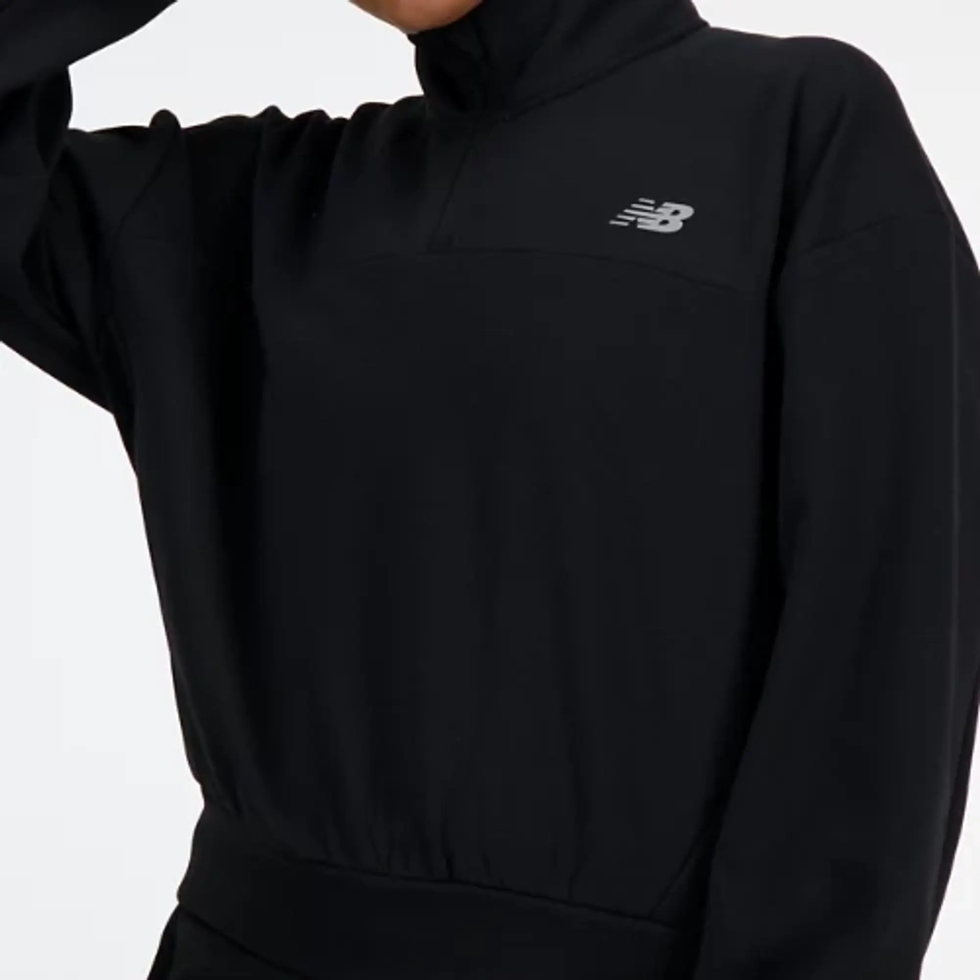 New Balance Women's Tech Knit Oversized Quarter Zip in Black Poly Knit
