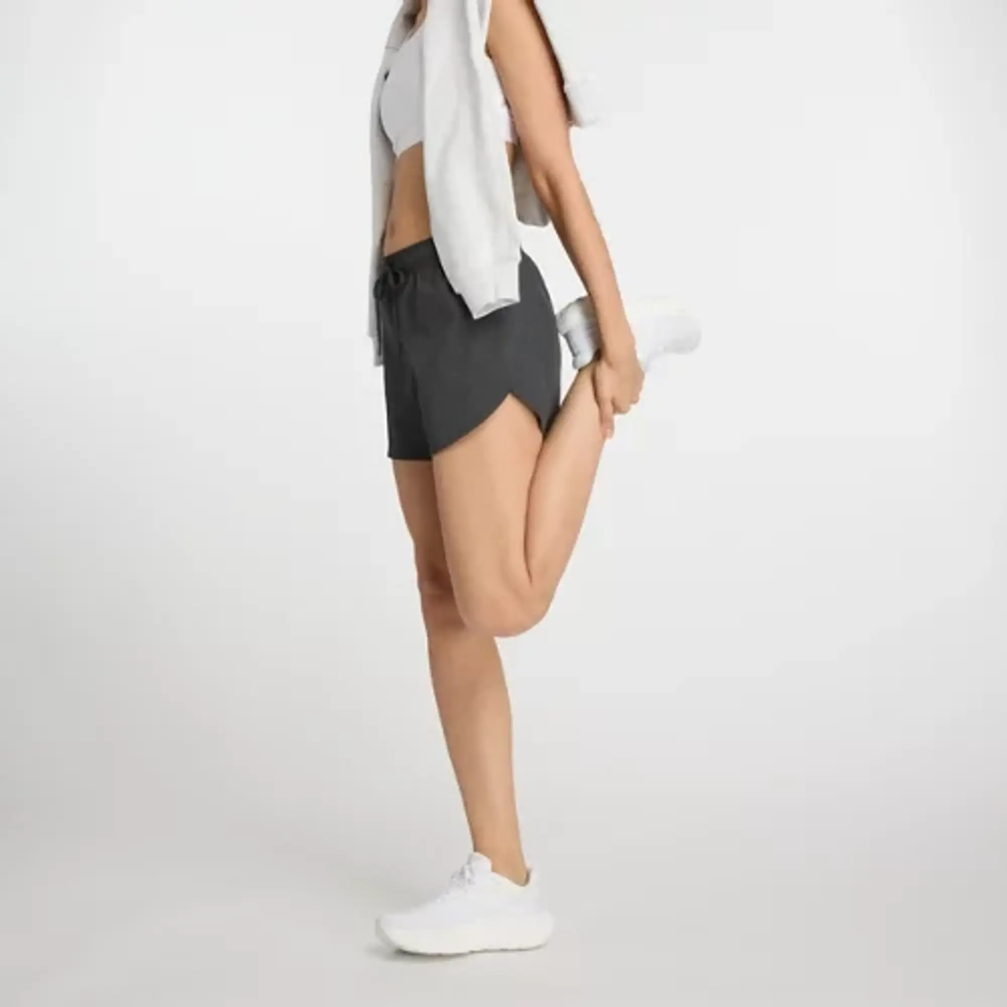 New Balance Women's Shifted Short in Black Polywoven