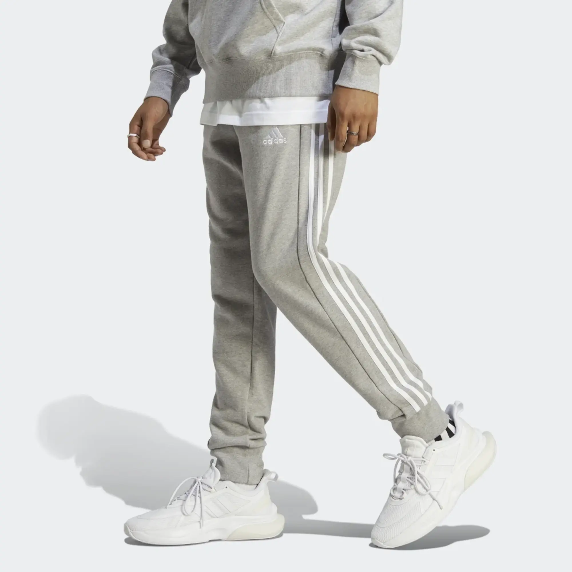 adidas  Essentials French Terry Tapered Cuff 3-Stripes Joggers  men's Sportswear in Grey