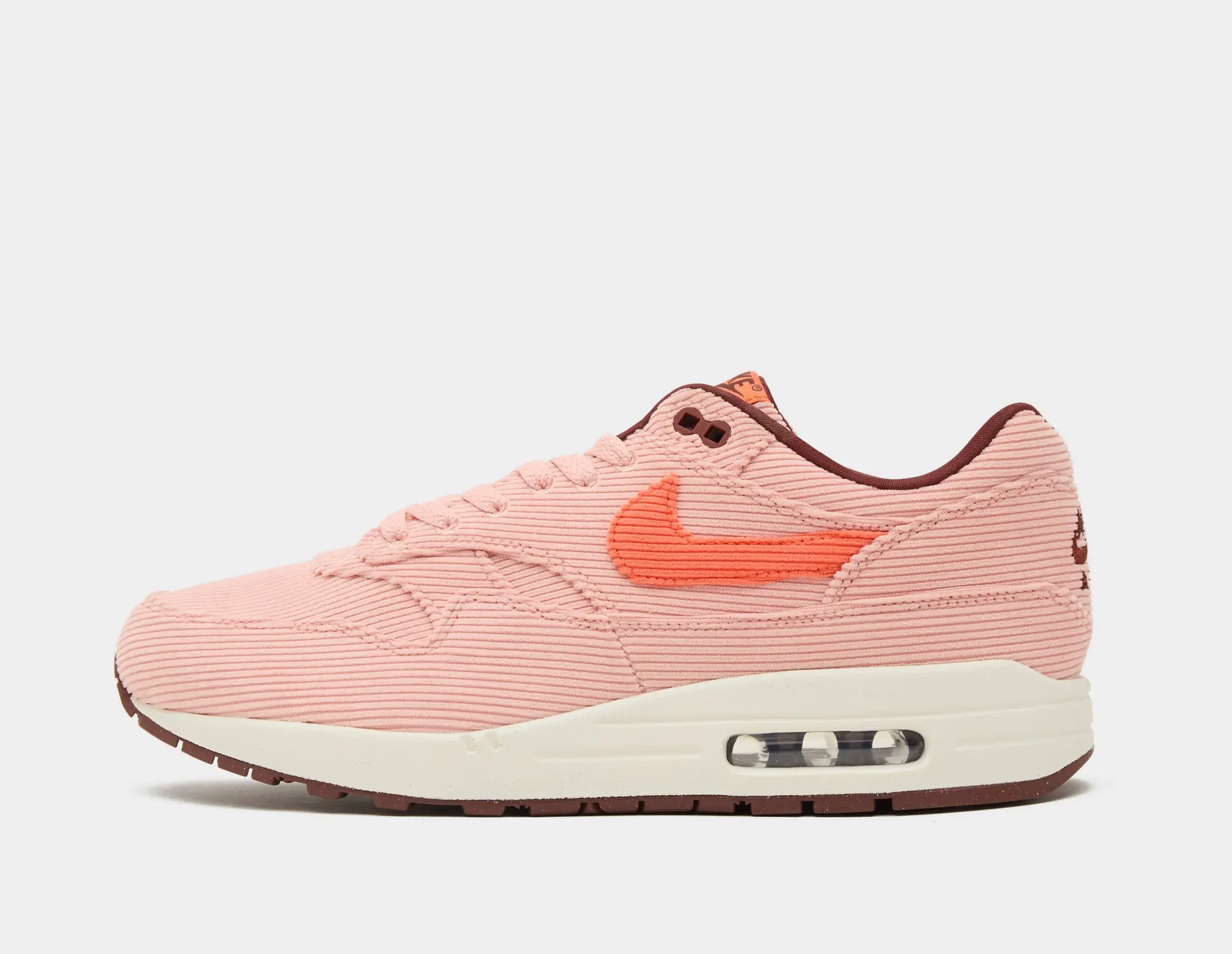 Nike pink trainers mens on sale