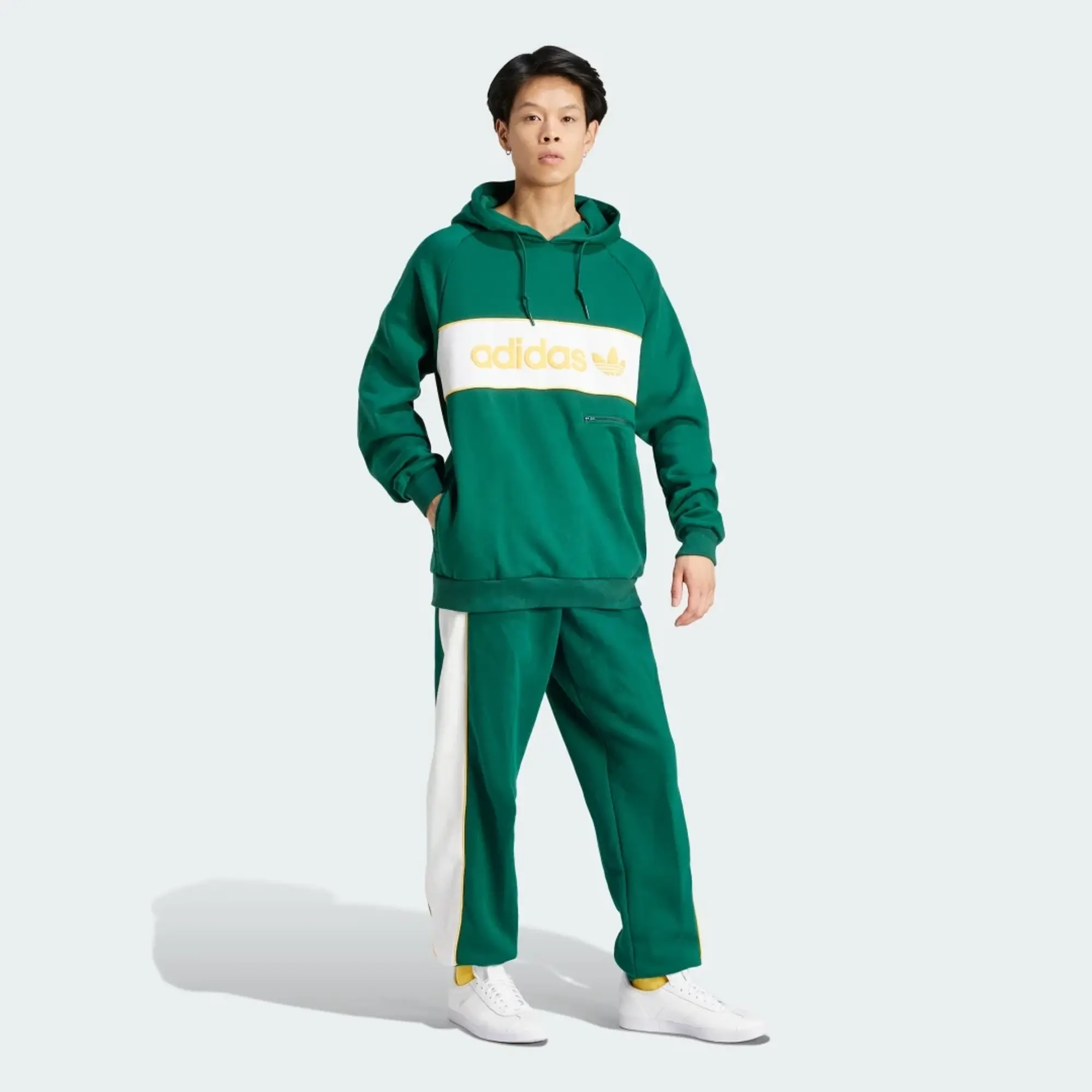 Dark green adidas hoodie with yellow logo sale