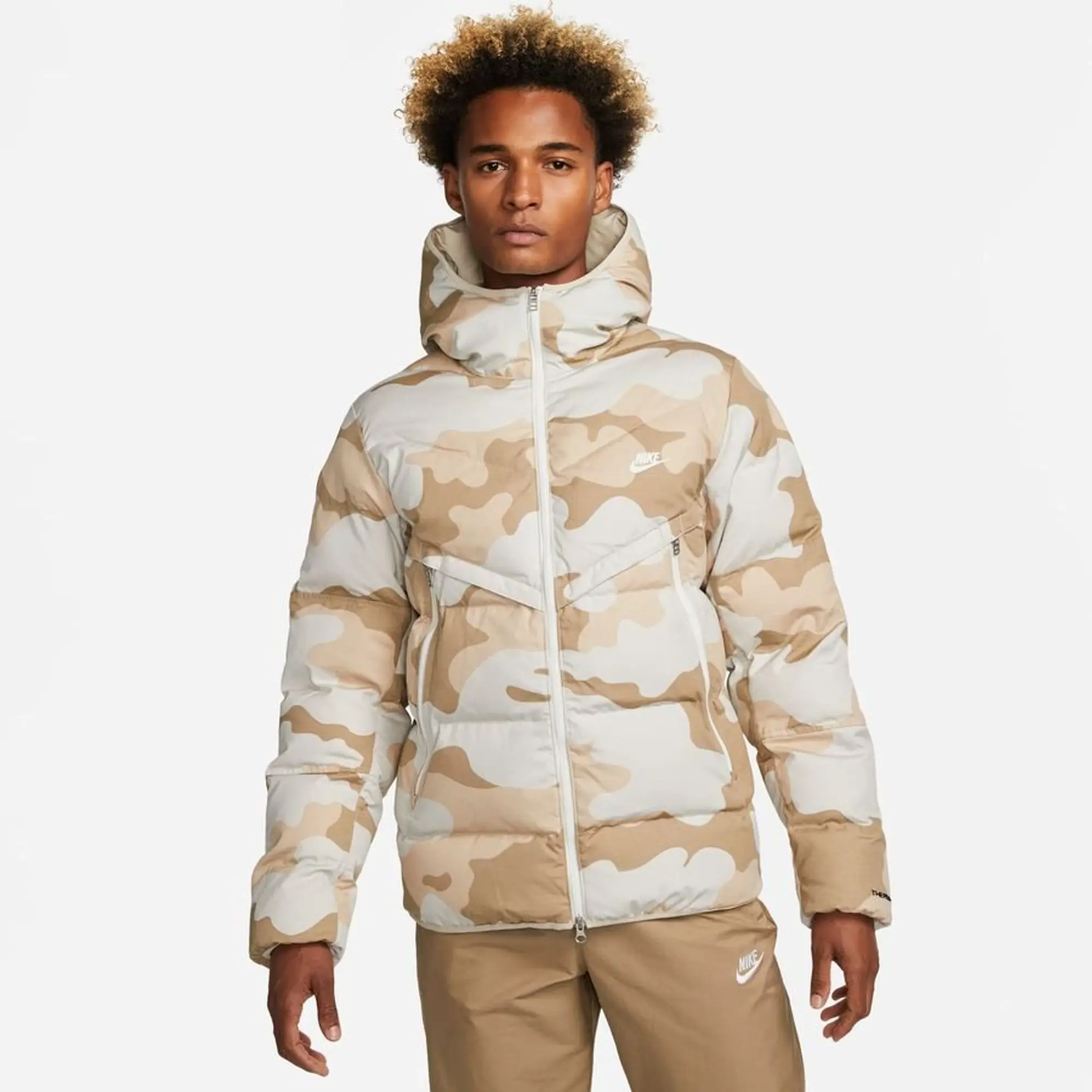 Nike Sportswear Storm FIT Windrunner Men s Poly Filled Hooded Camo Jacket Cream DQ4935 072 FOOTY.COM