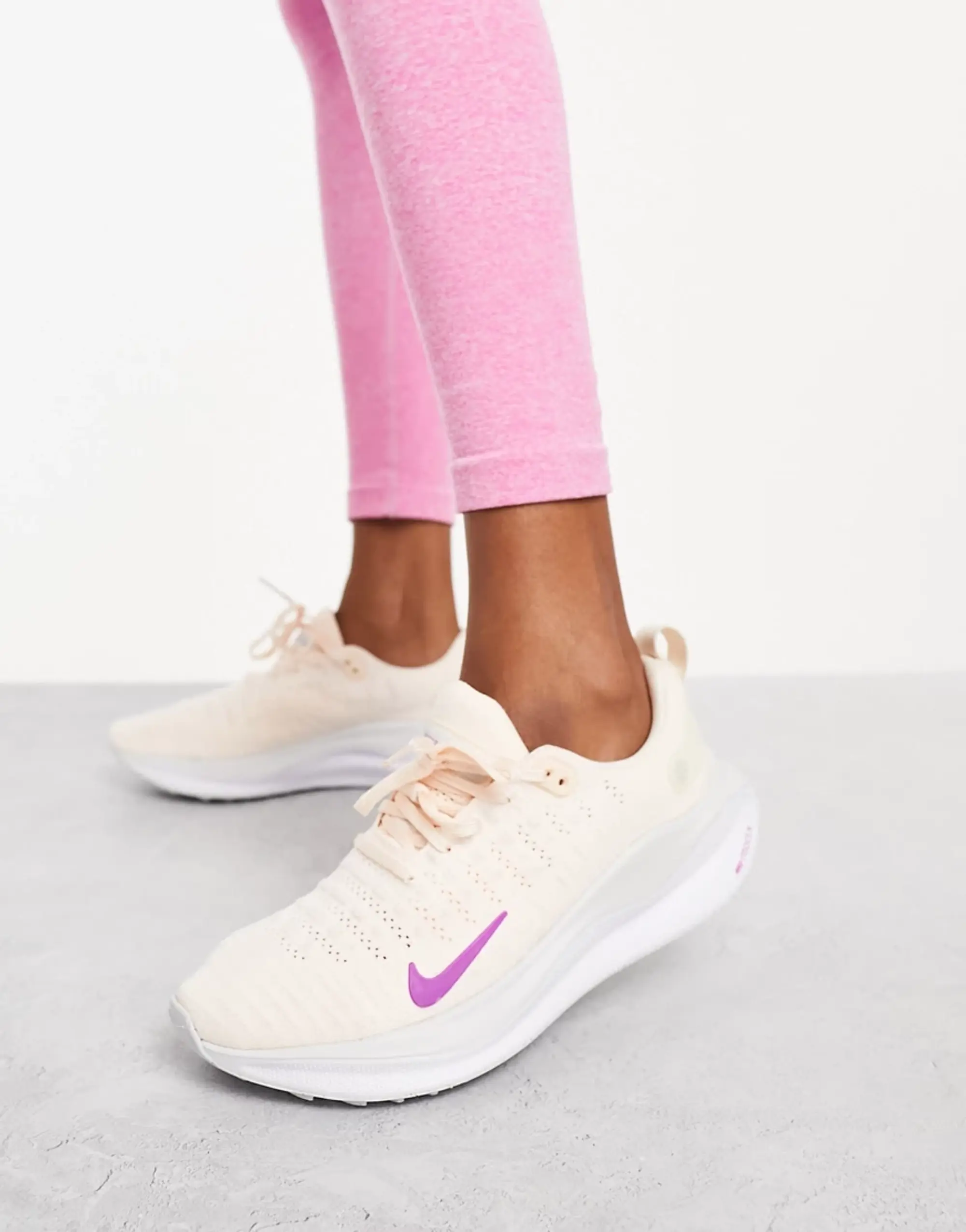 Nike Running React Infinity Run 4 Trainers In Beige And Pink