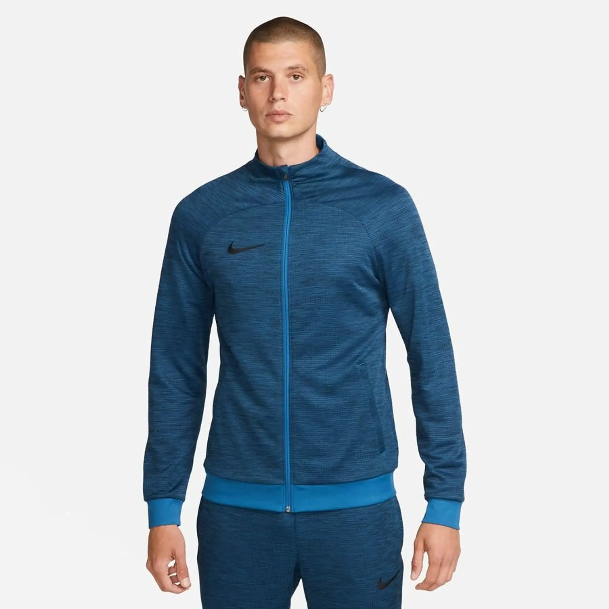 Blue nike track top online