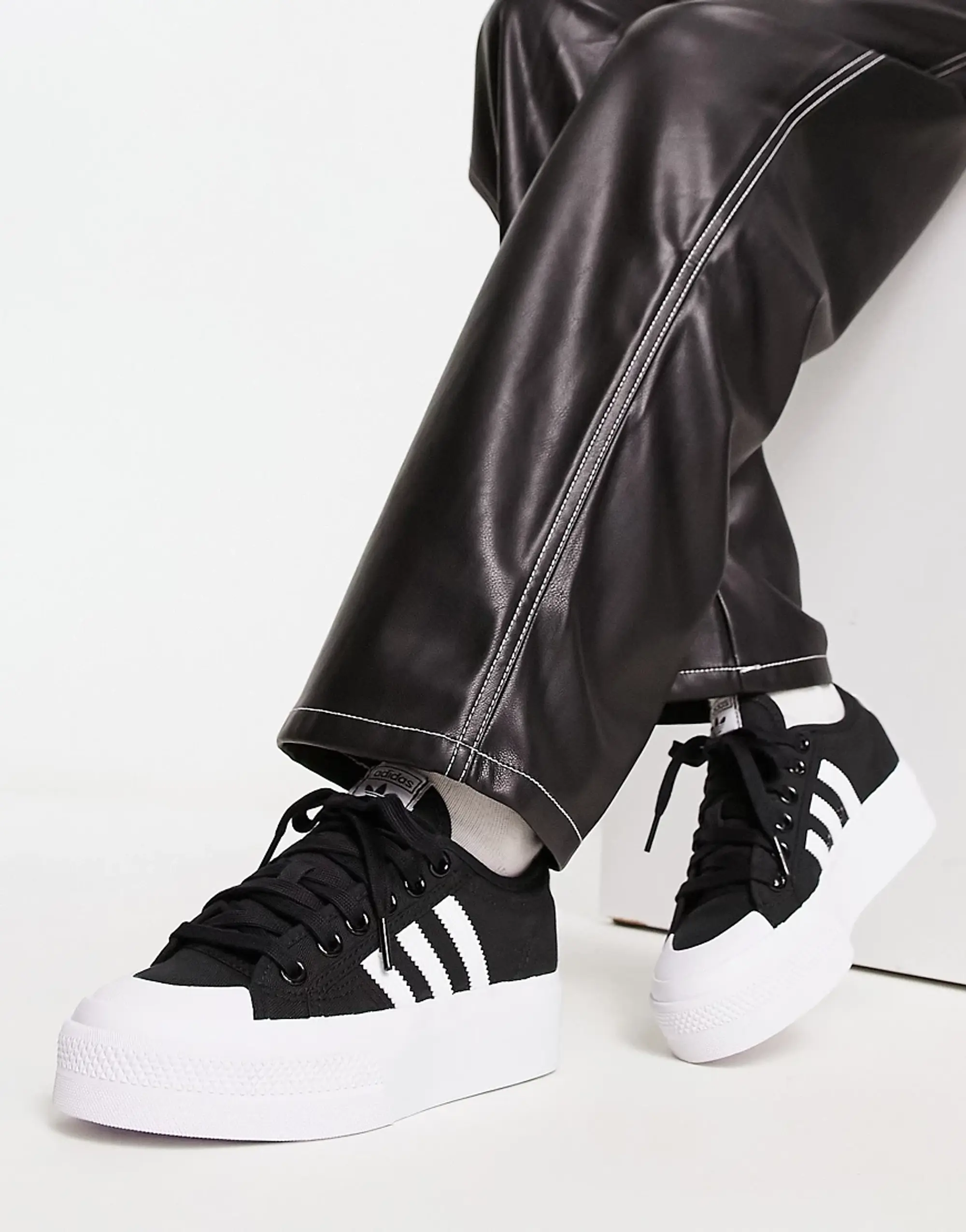 adidas Originals adidas nizza platform trainers in black & white