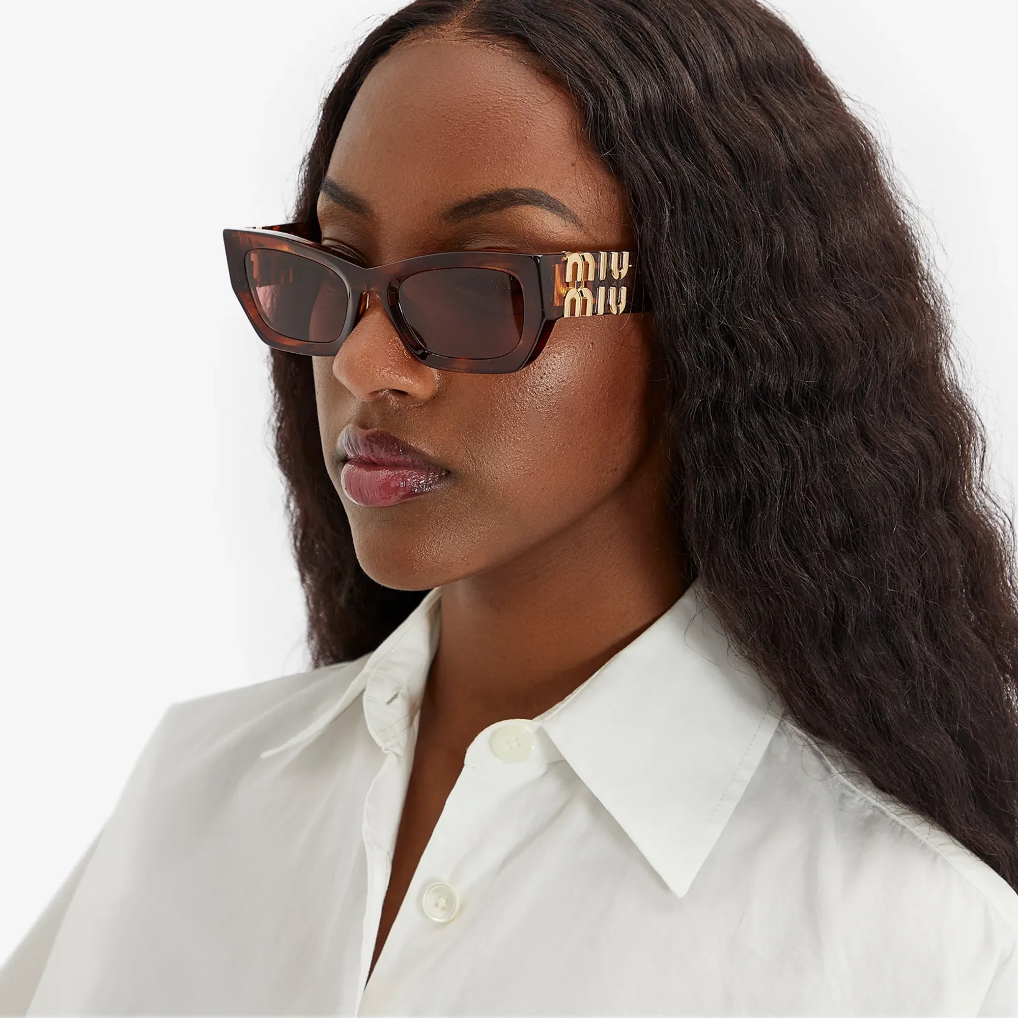miu miu striped tobacco Buy Glasses Online and emancipated little sister Miu Miu Oval Sunglasses in