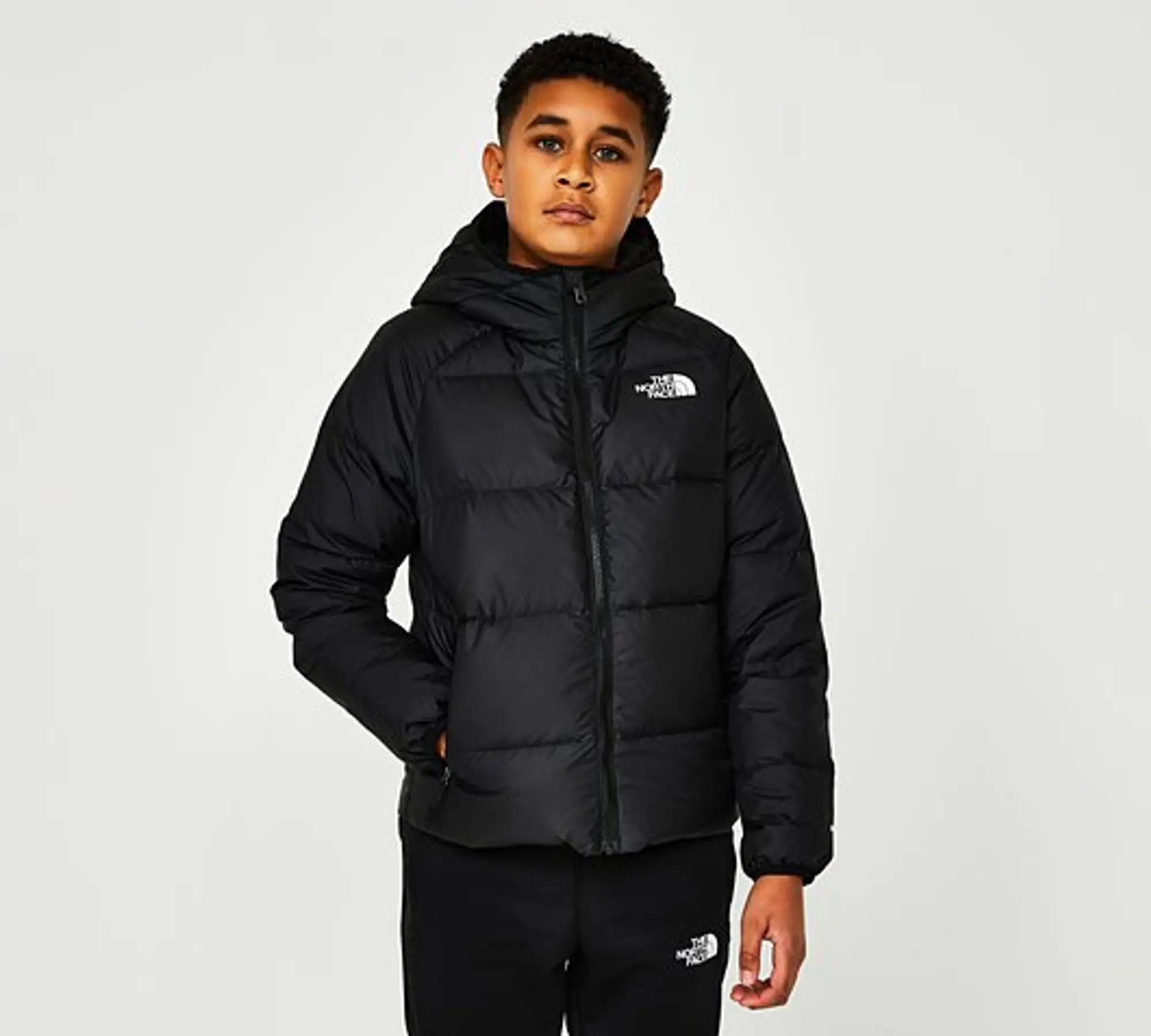 The North Face Junior Printed Reversible Down Hooded Jacket Black NF0A7WOPJK3 FOOTY.COM