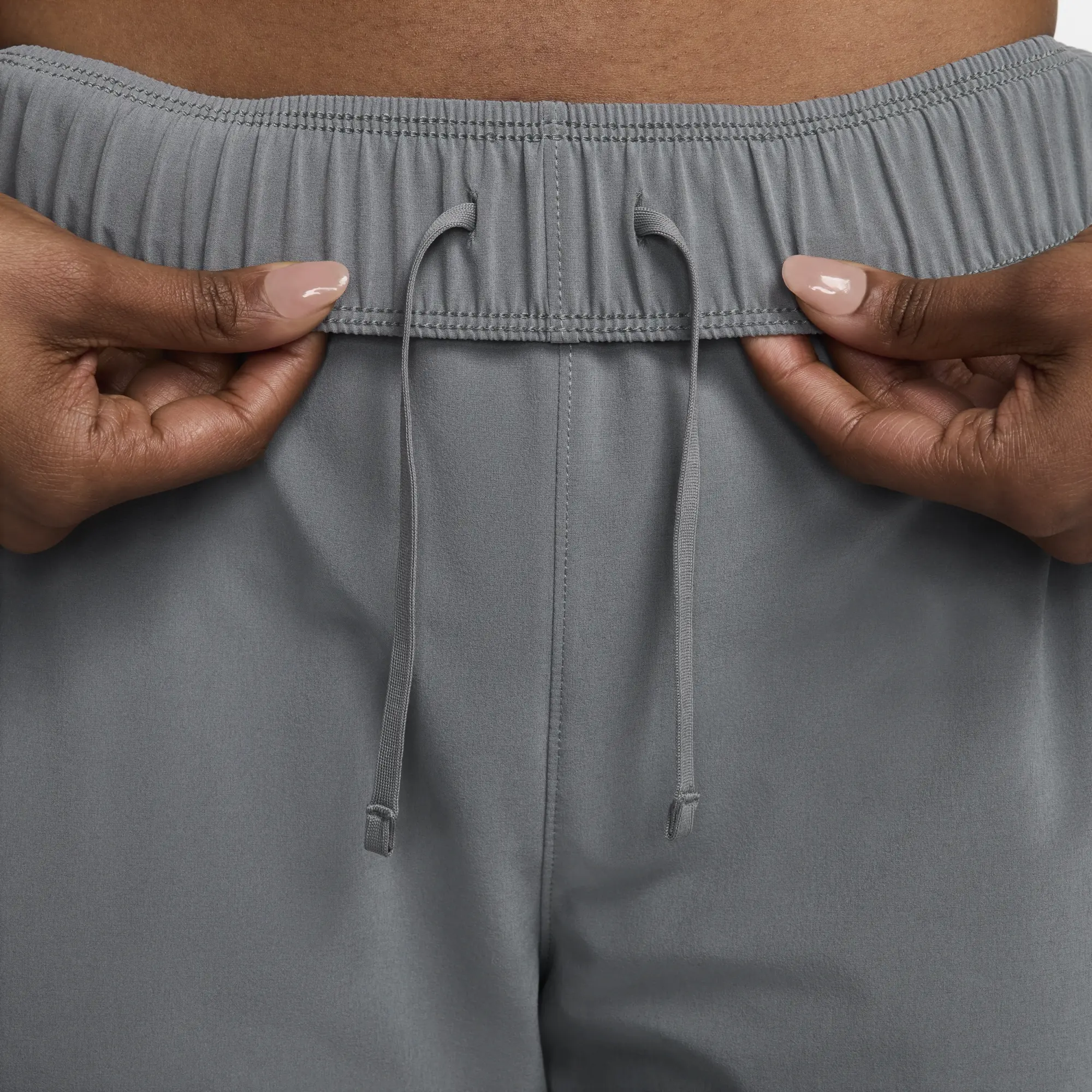 Nike Dri-FIT Fast Women's Mid-Rise 7/8 Running Trousers - Grey - Recycled Polyester Minimum