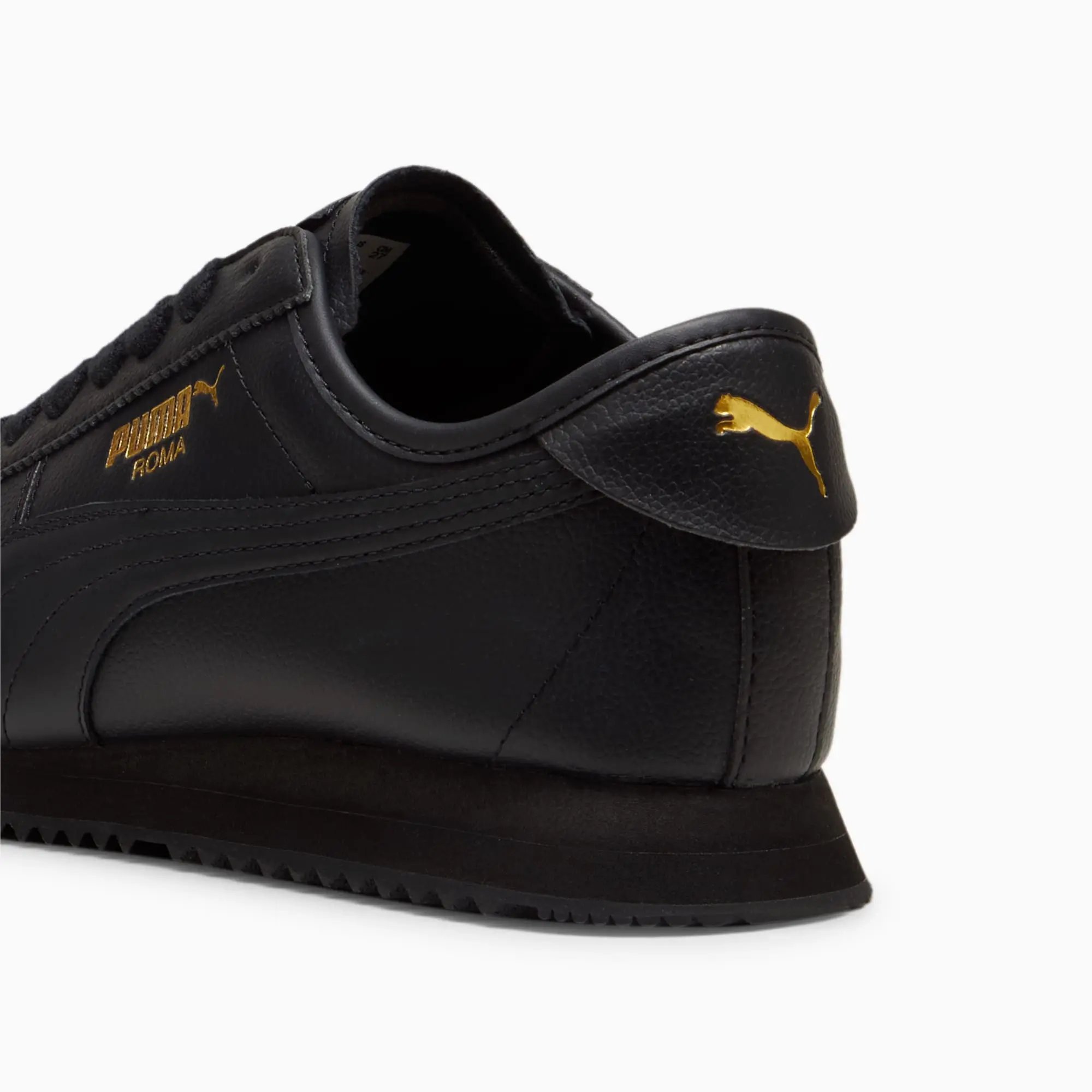 Puma roma black and gold shoes hotsell