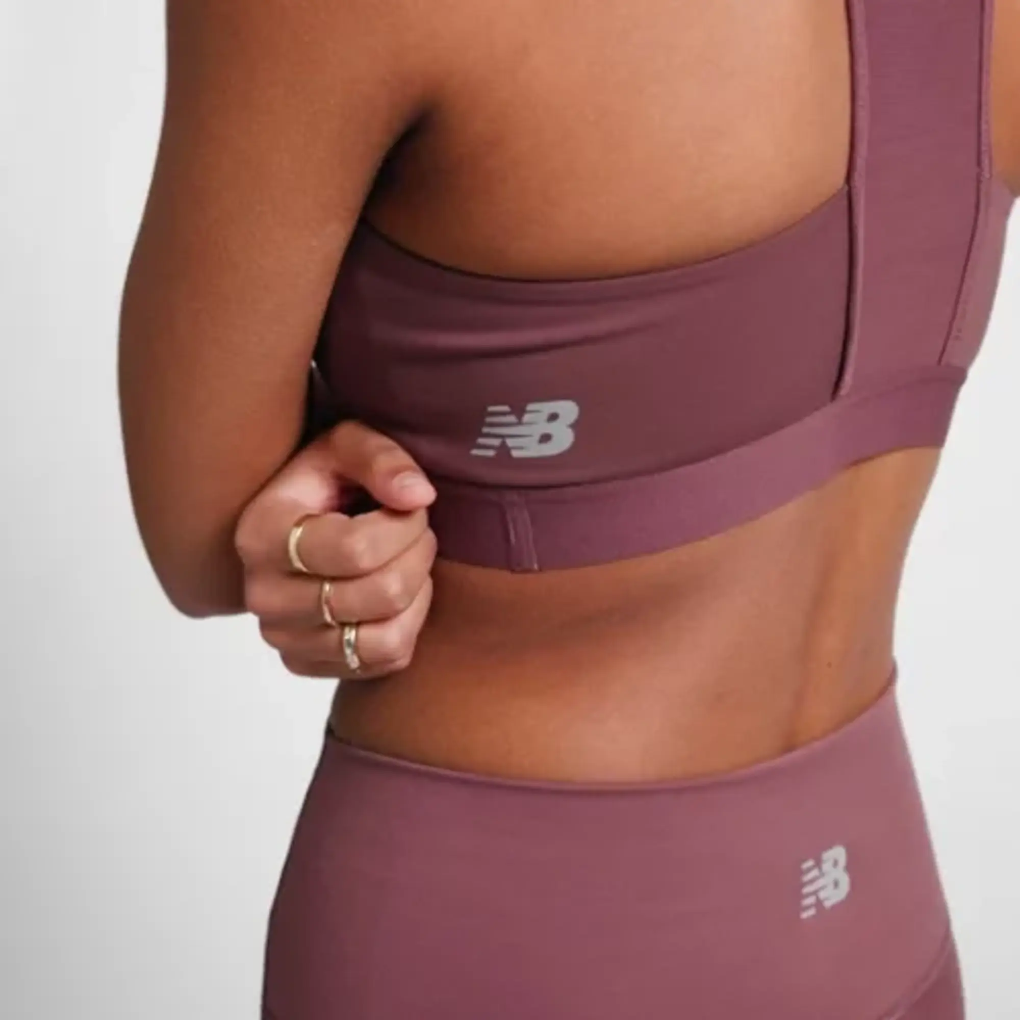 New Balance Women's NB Sleek Medium Support Pocket Sports Bra in Green Poly Knit