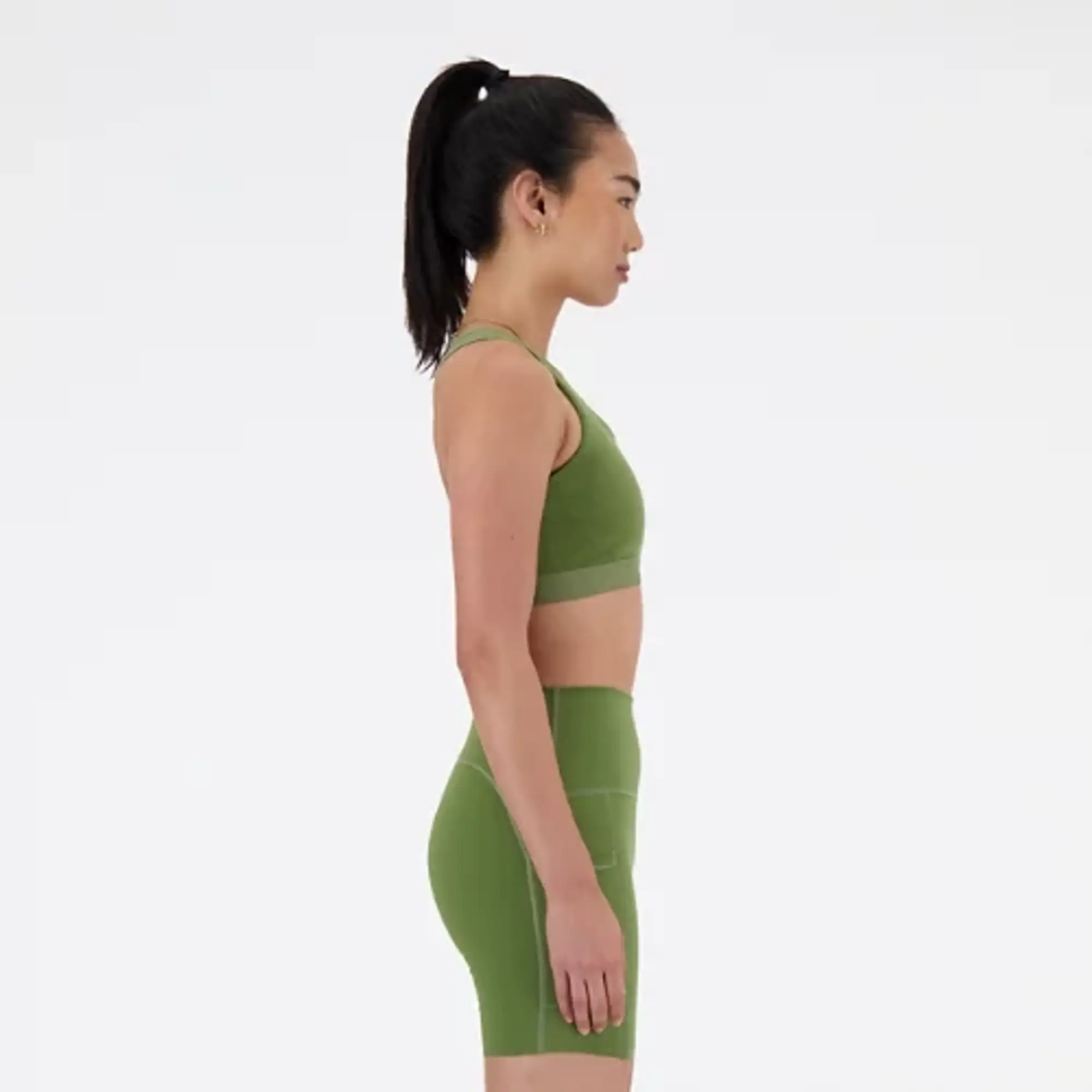 New Balance Women's NB Sleek Medium Support Pocket Sports Bra in Green Poly Knit