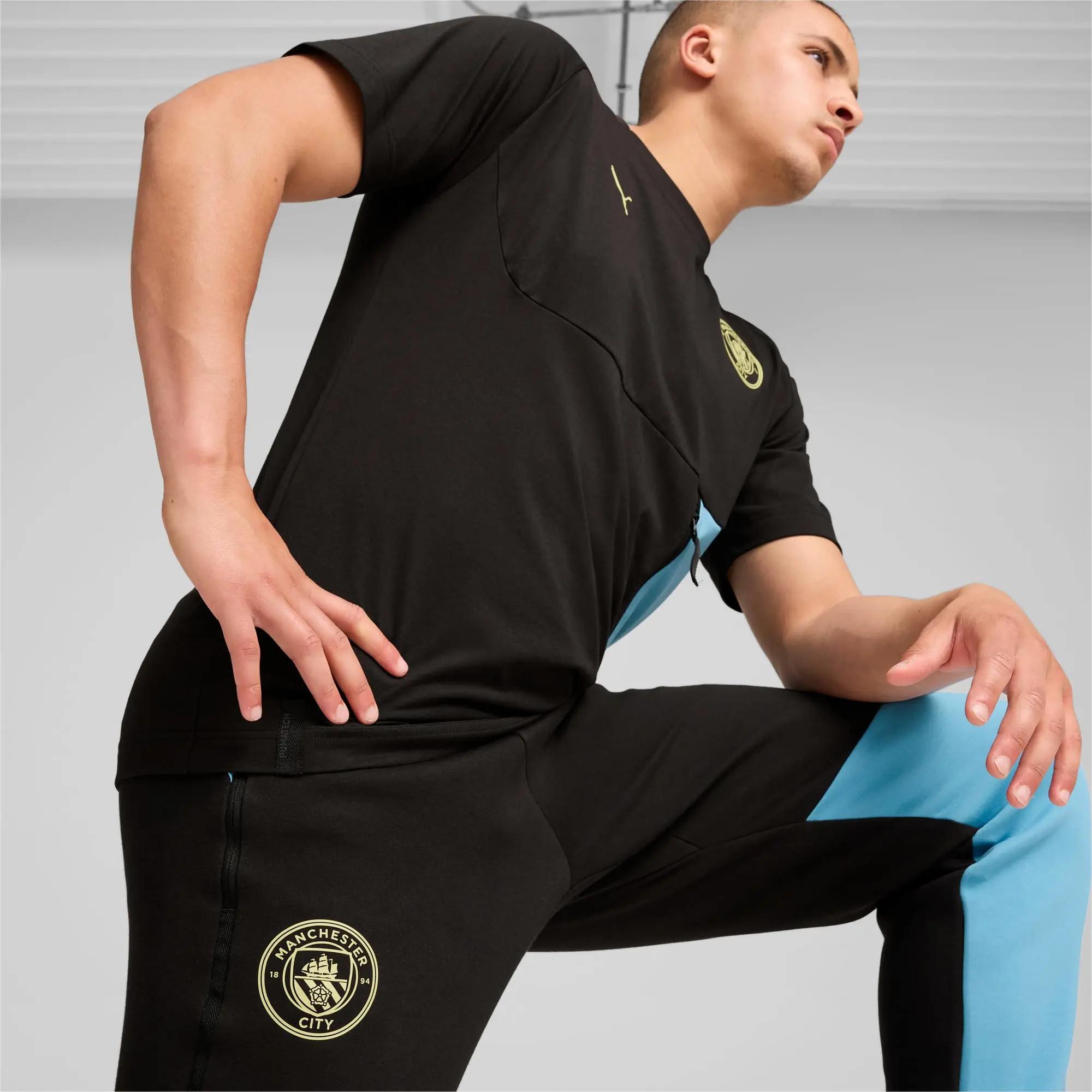 Manchester City PUMAtech Track Pant Men, Black/Magic Blue