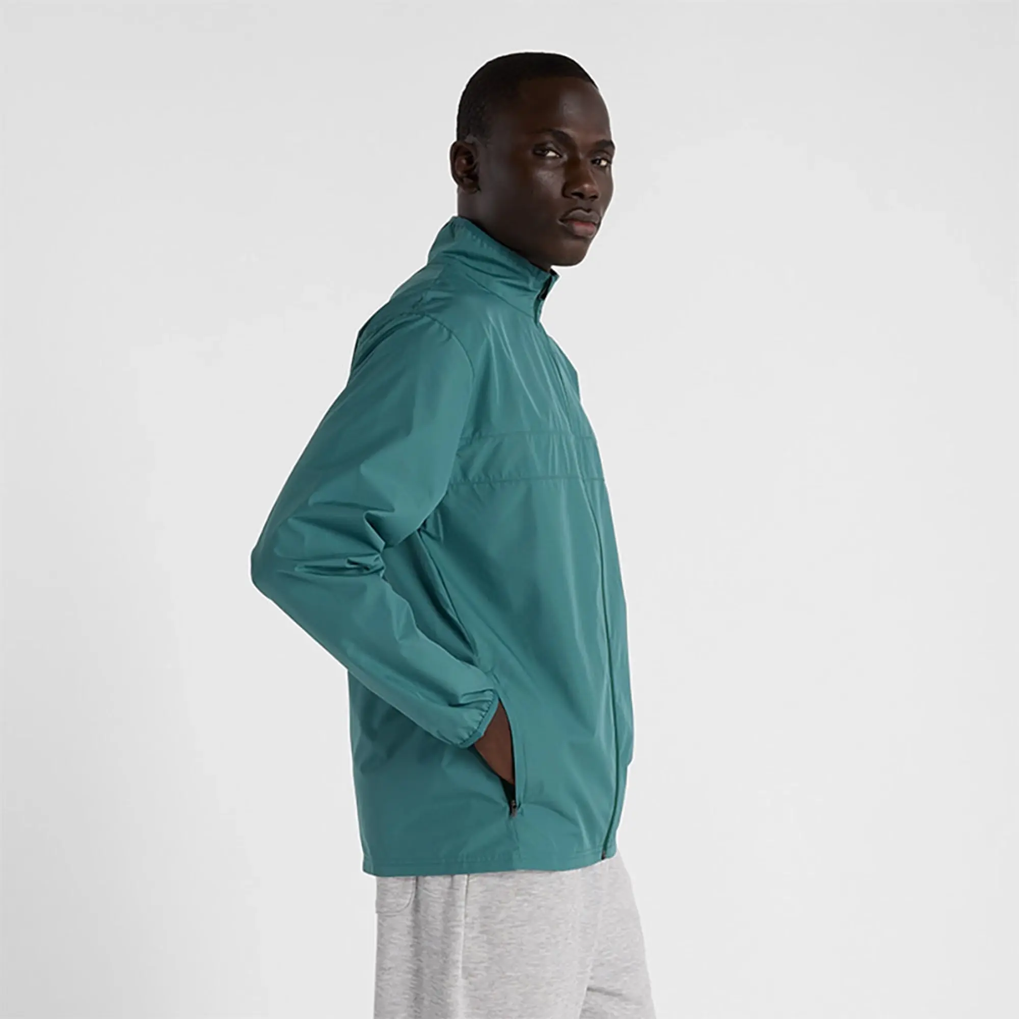 New Balance Men's Sport Essentials Jacket in Green Polywoven
