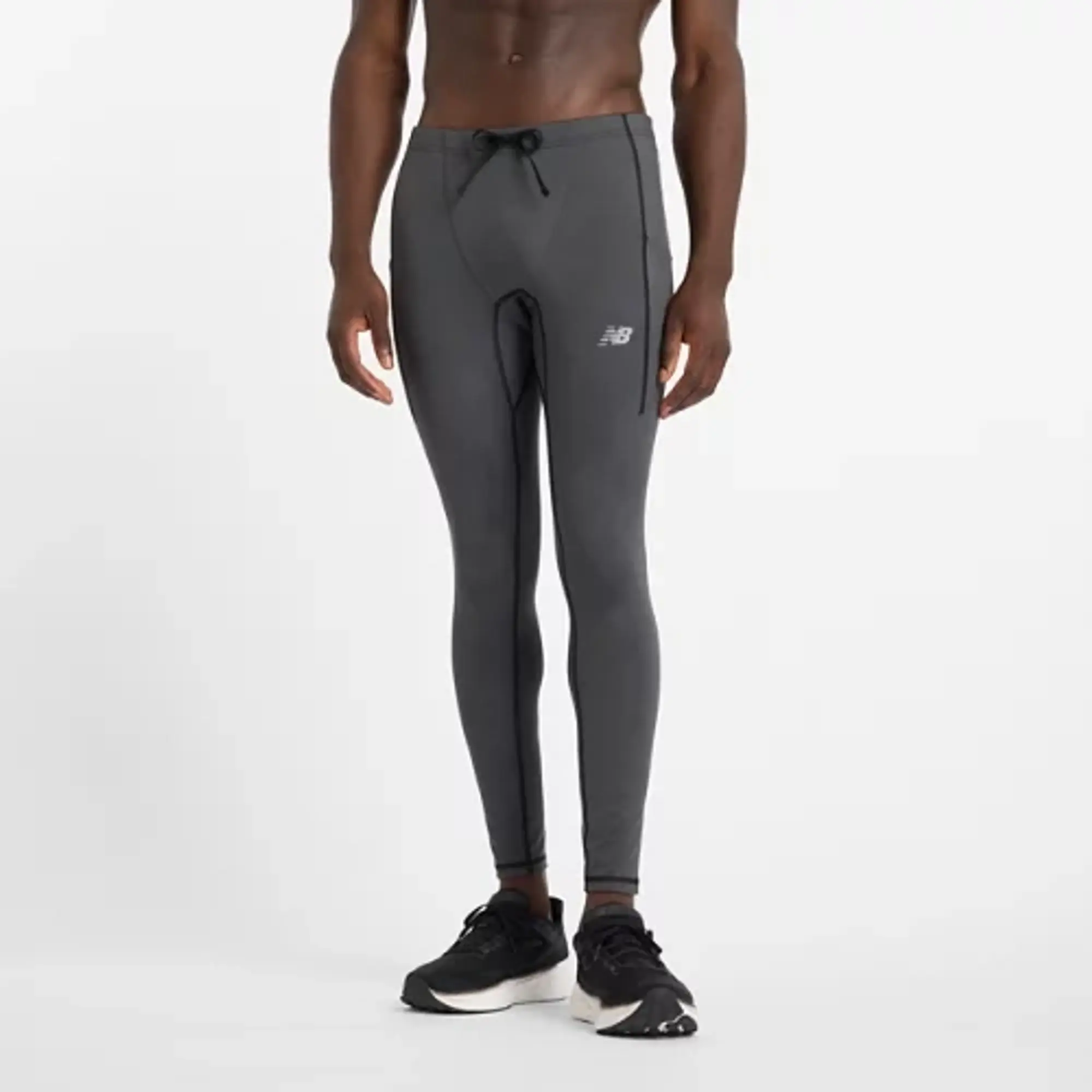 New Balance Men's Athletics Reflective Warming Pocket Tight in Black Poly Knit