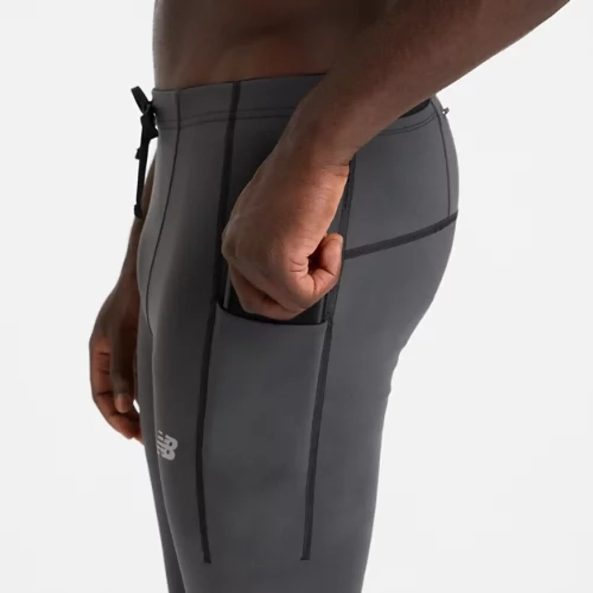 New Balance Men's Athletics Reflective Warming Pocket Tight in Black Poly Knit