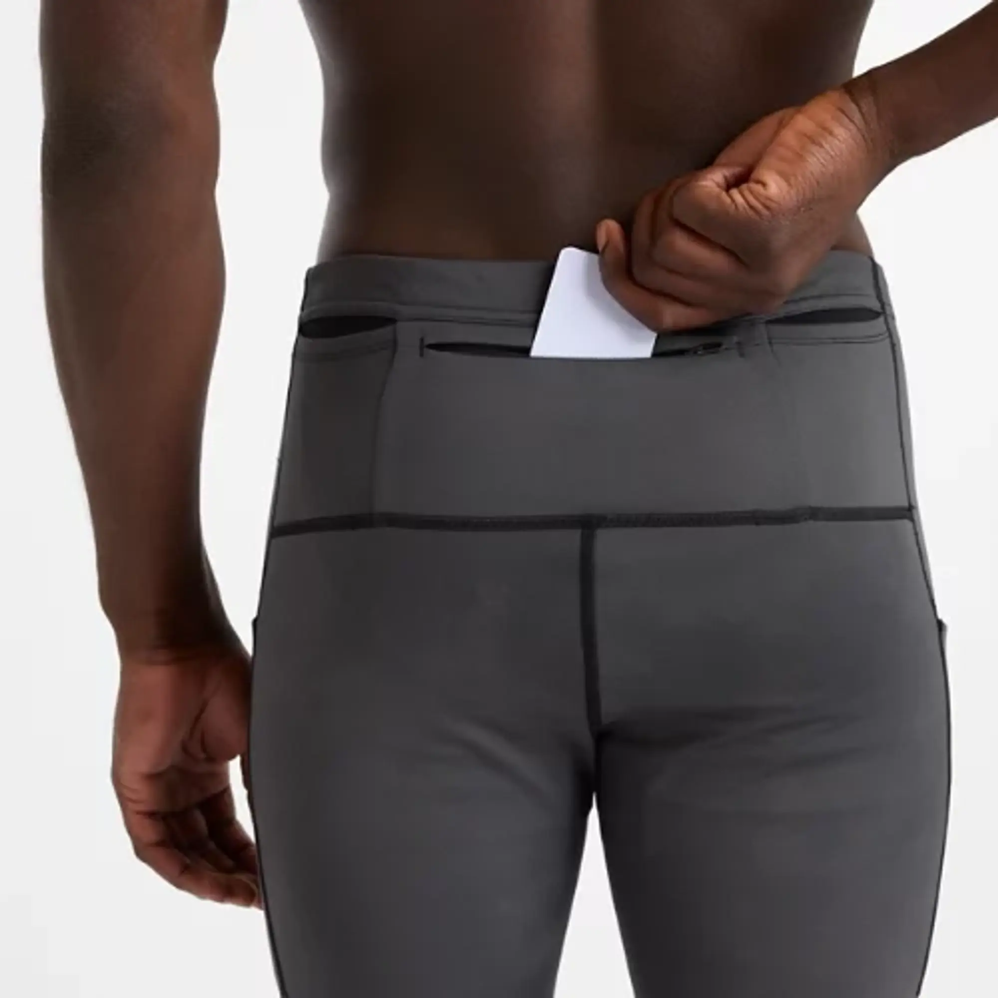 New Balance Men's Athletics Reflective Warming Pocket Tight in Black Poly Knit