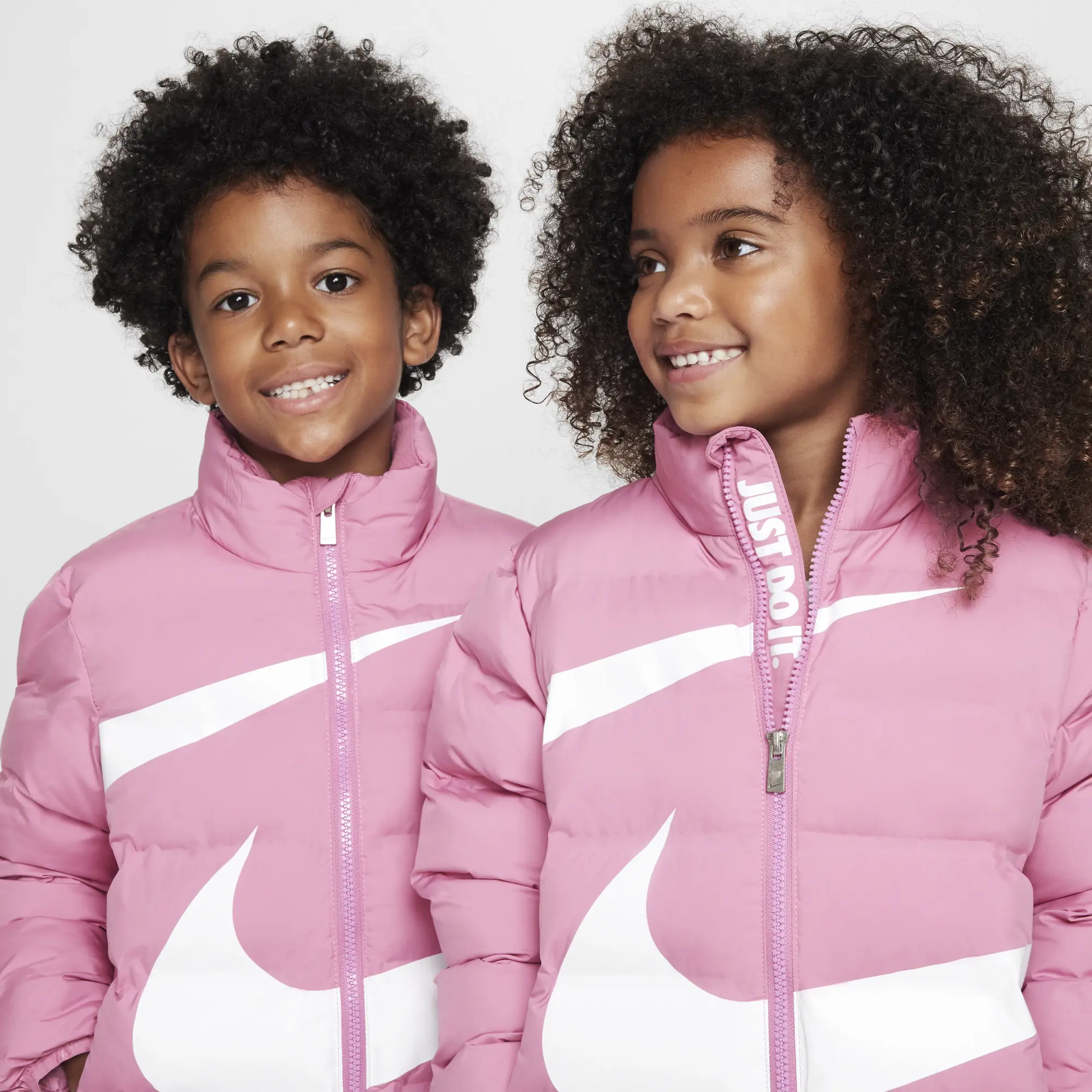 Nike Younger Kids' Wrapped Swoosh Debossed Quilted Jacket - Pink - Polyester