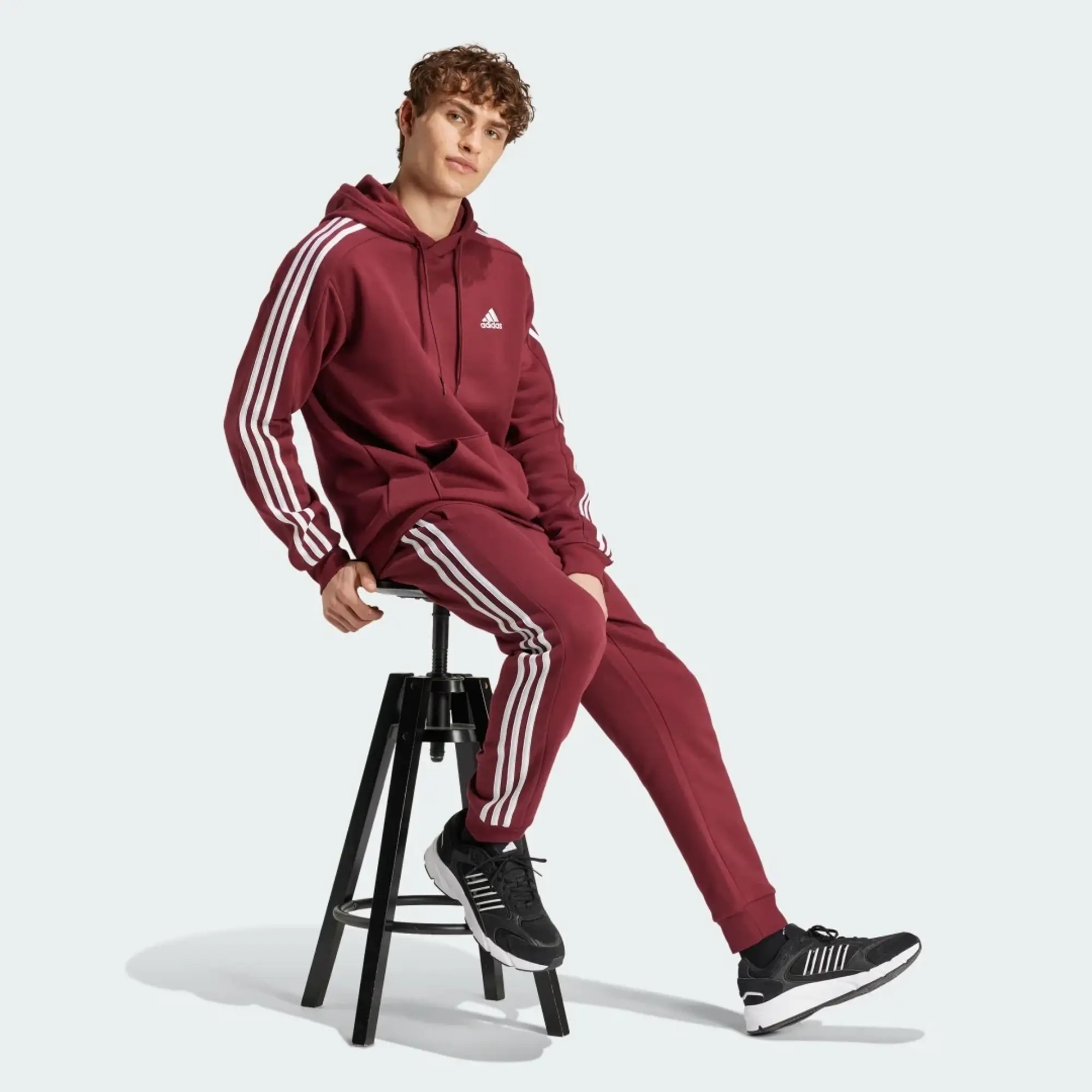 Manchester United x adidas Mens Essentials Fleece 3-Stripes Tapered Joggers Burgundy