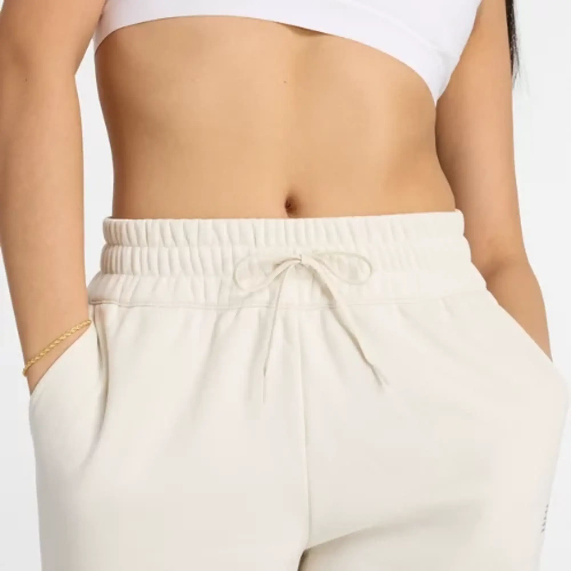New Balance Women's Performance Fleece Jogger in Beige Poly Fleece