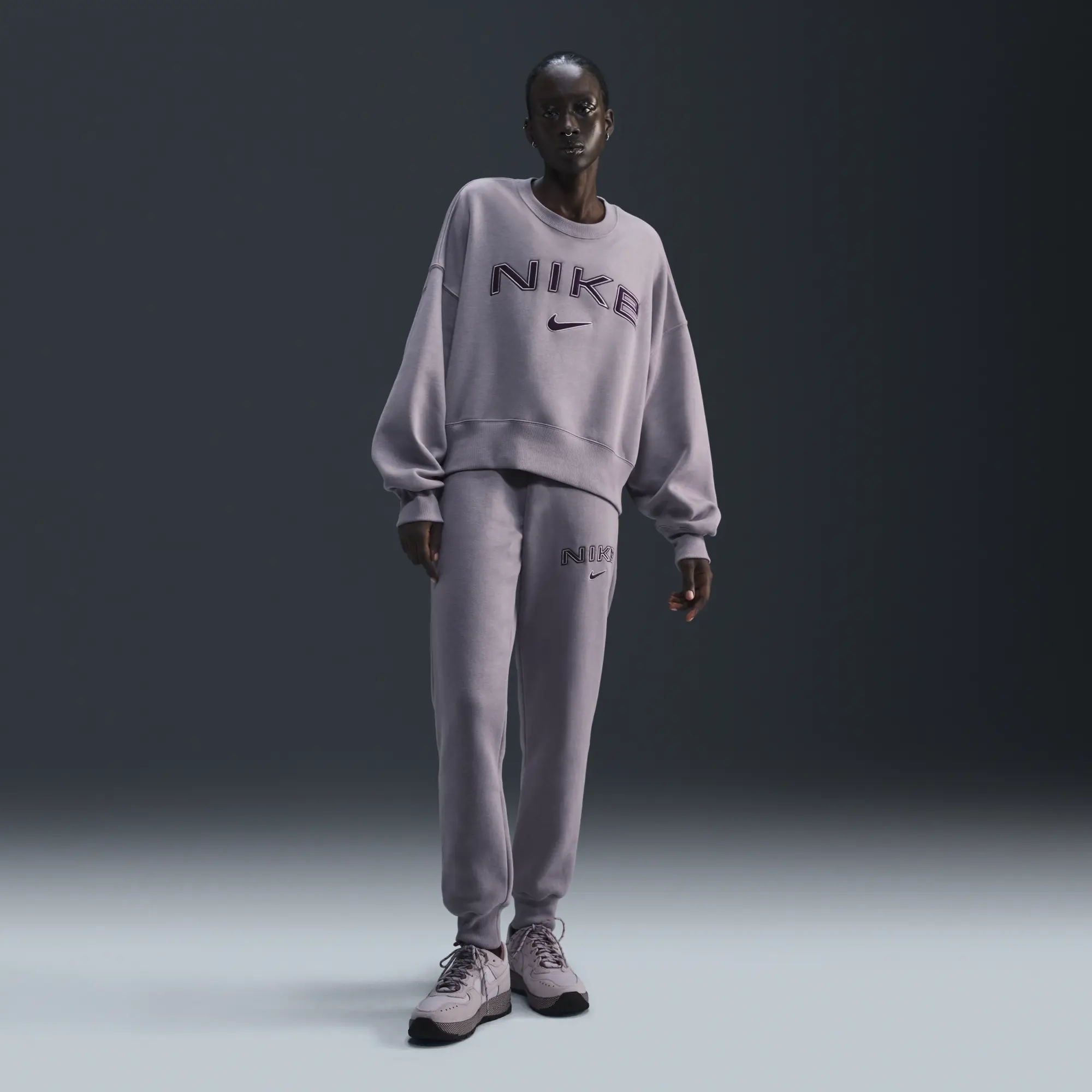 Nike Phoenix Fleece Logo Sweatshirt In Purple