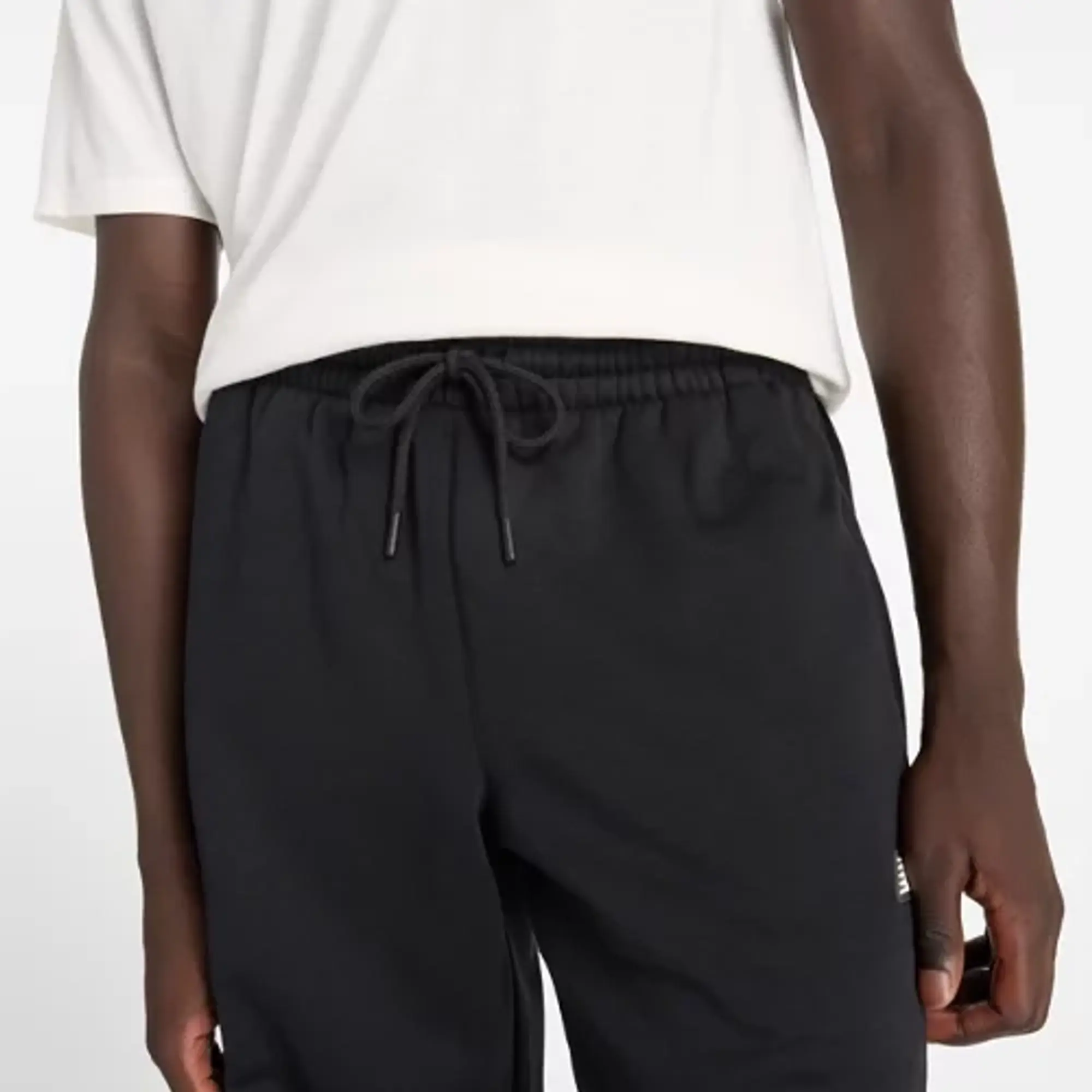 New Balance Men's All Day Uniform Pant in Black Poly Knit