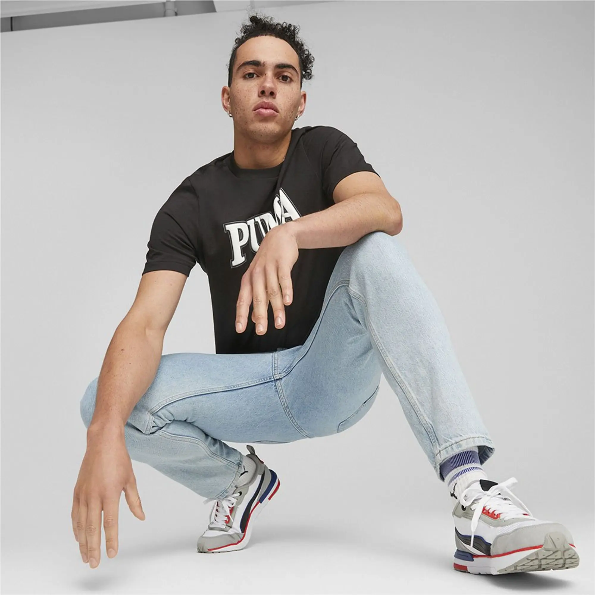 Puma  PUMA SQUAD TEE  men's T shirt in Black