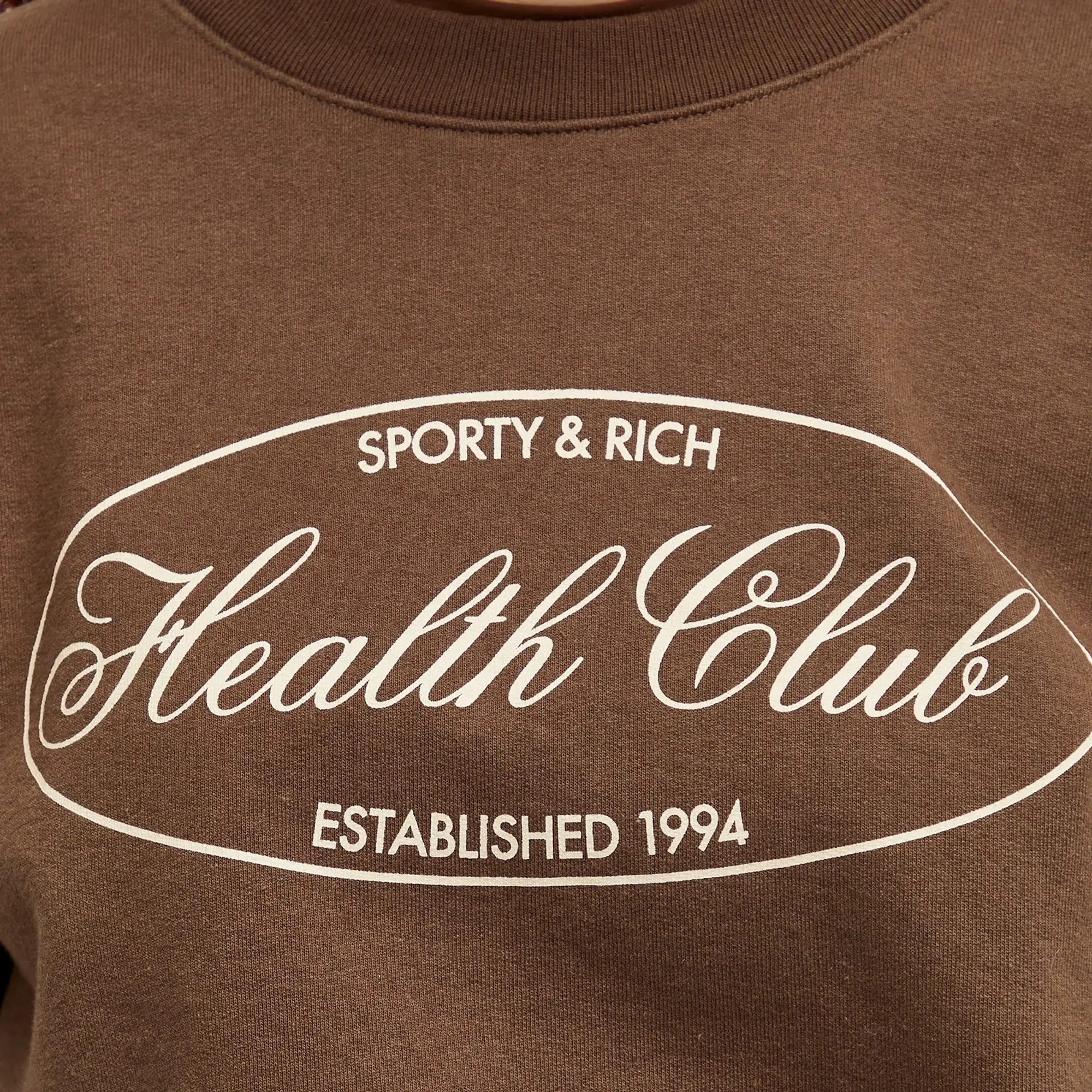 Sporty & Rich Women's Oval Health Crewneck Chocolate Cream