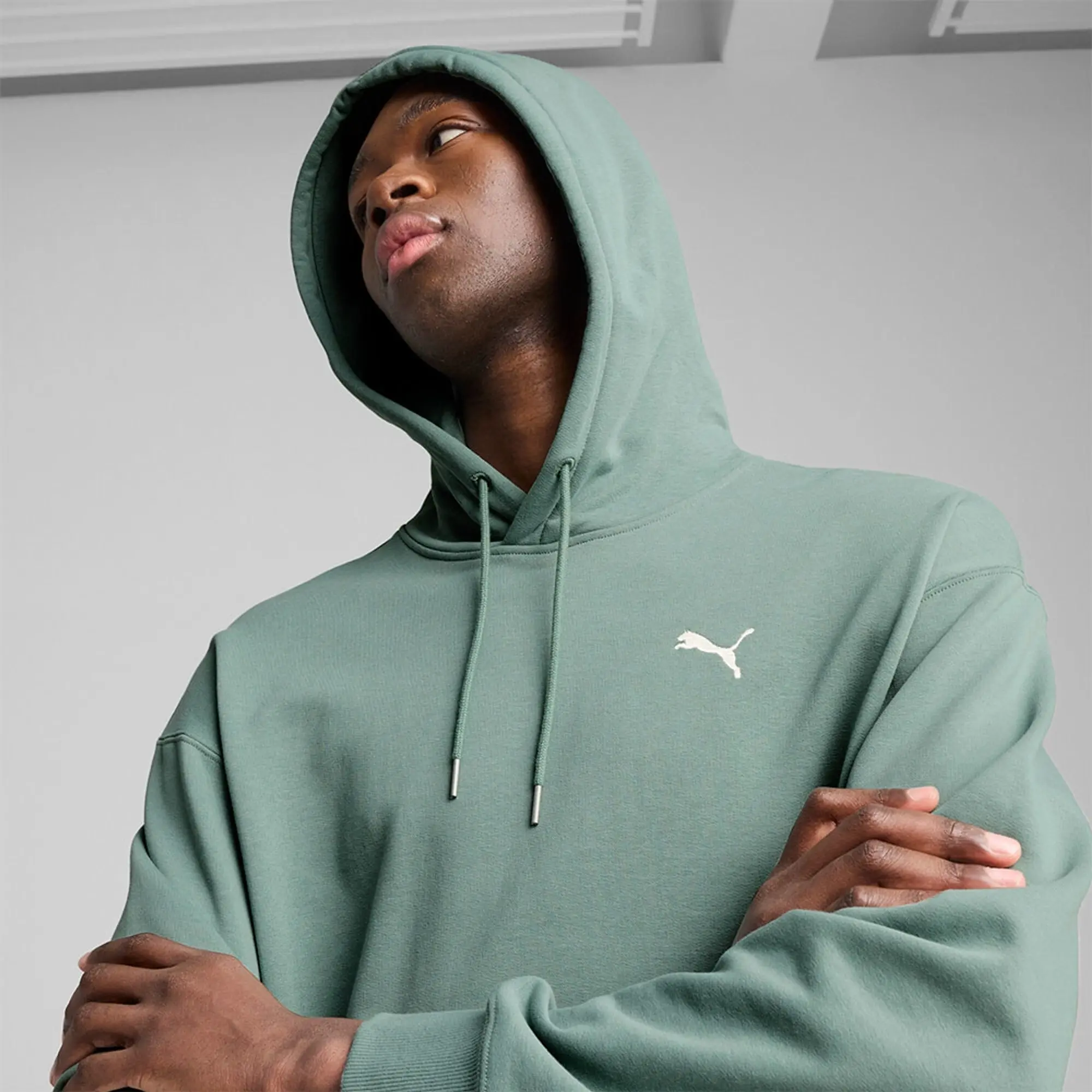 PUMA Wardrobe Ess Relaxed Hoodie Men, Green Moon