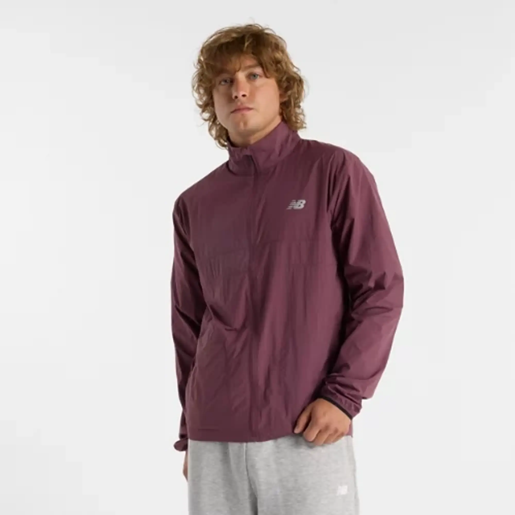 New Balance Men's Athletics Packable Jacket in Purple Polywoven