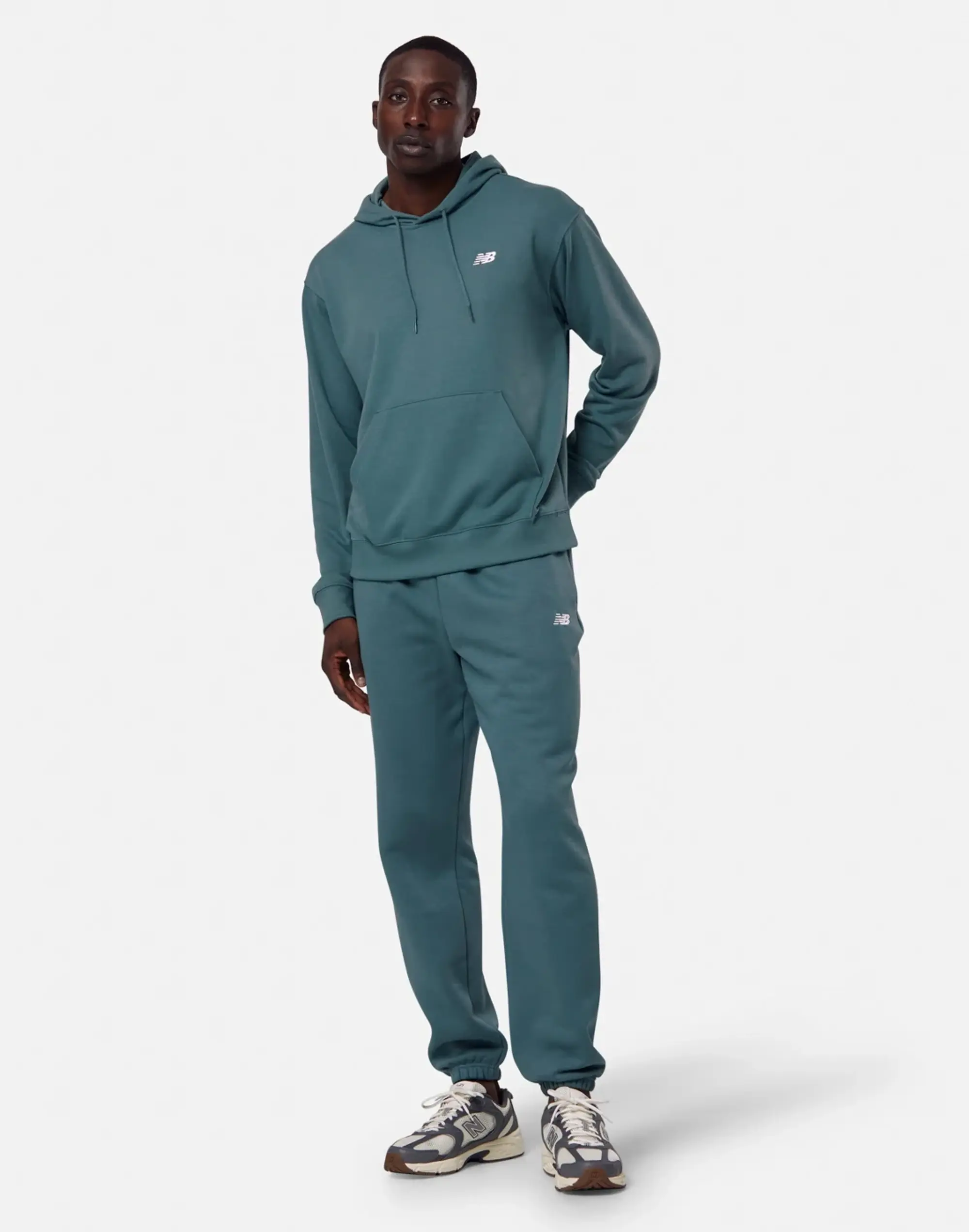 New Balance Men's Sport Essentials Fleece Jogger in Green Cotton
