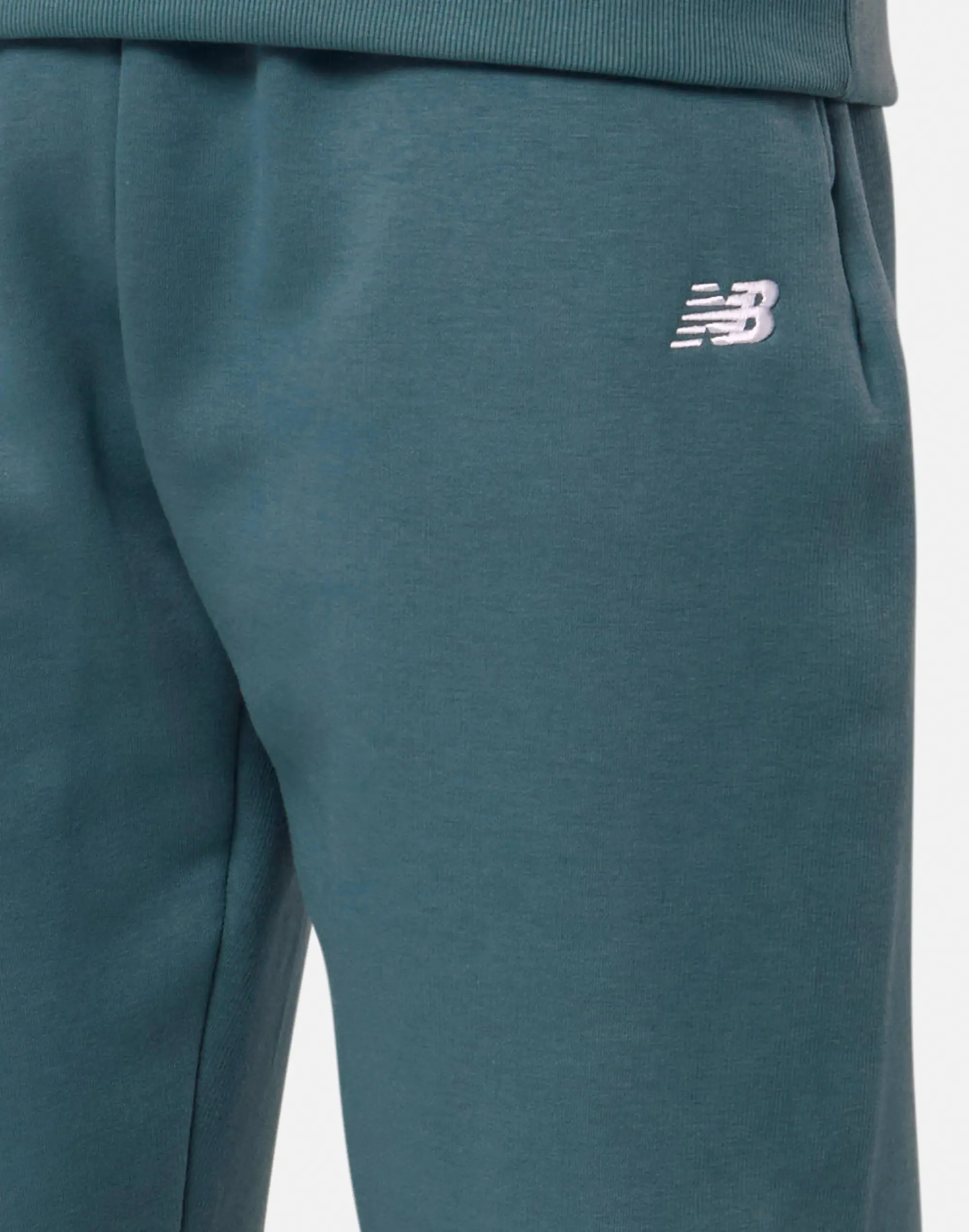 New Balance Men's Sport Essentials Fleece Jogger in Green Cotton