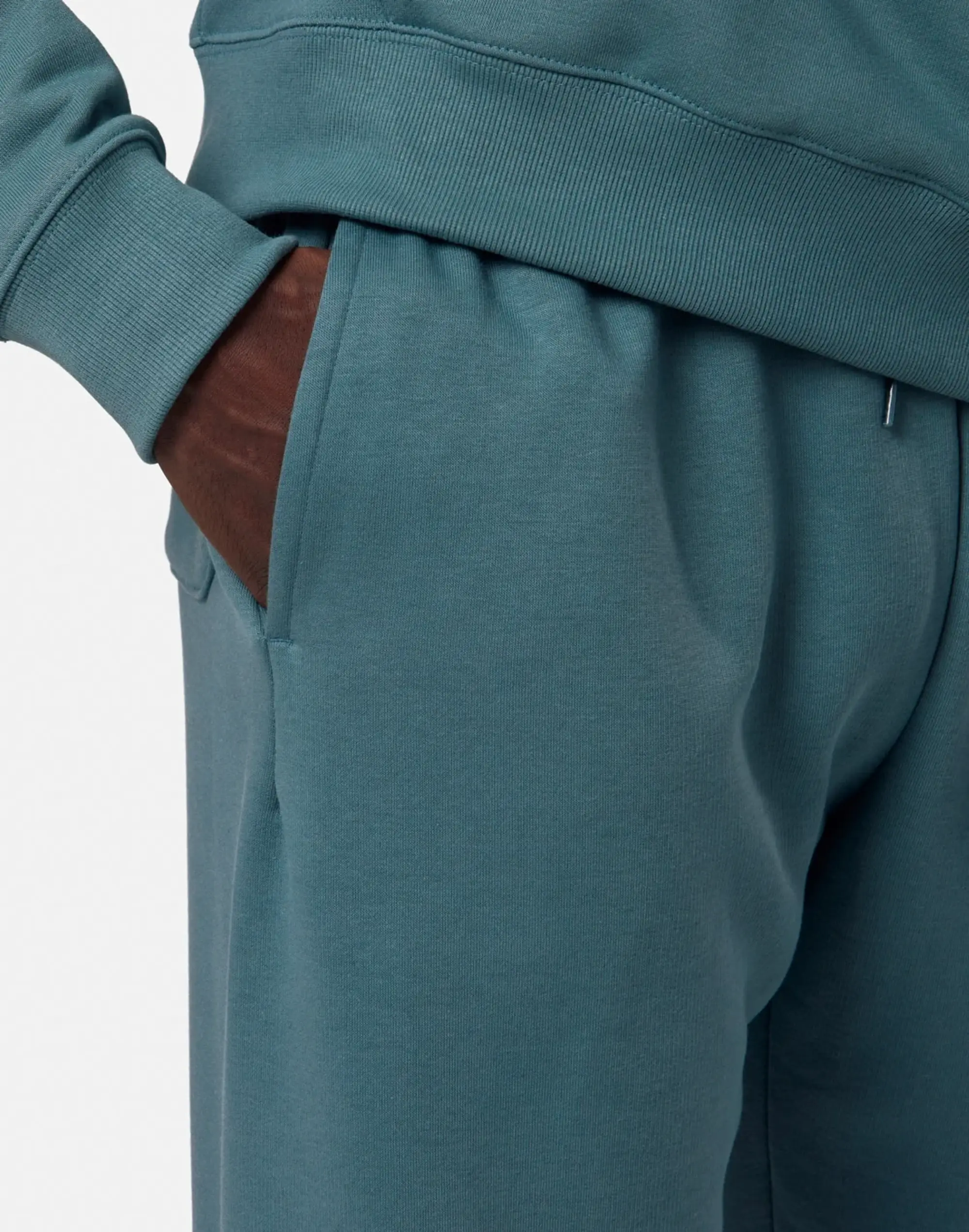 New Balance Men's Sport Essentials Fleece Jogger in Green Cotton