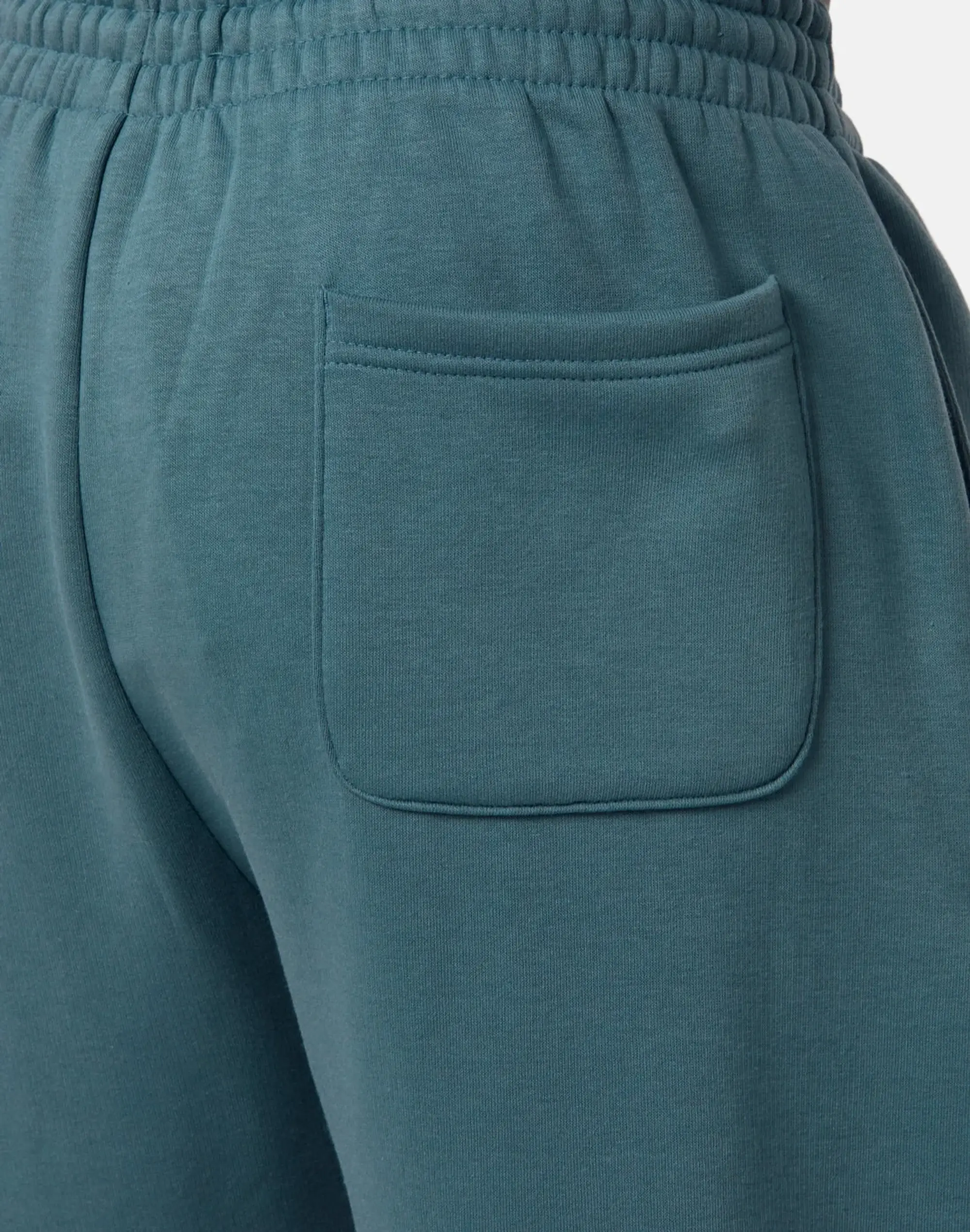 New Balance Men's Sport Essentials Fleece Jogger in Green Cotton
