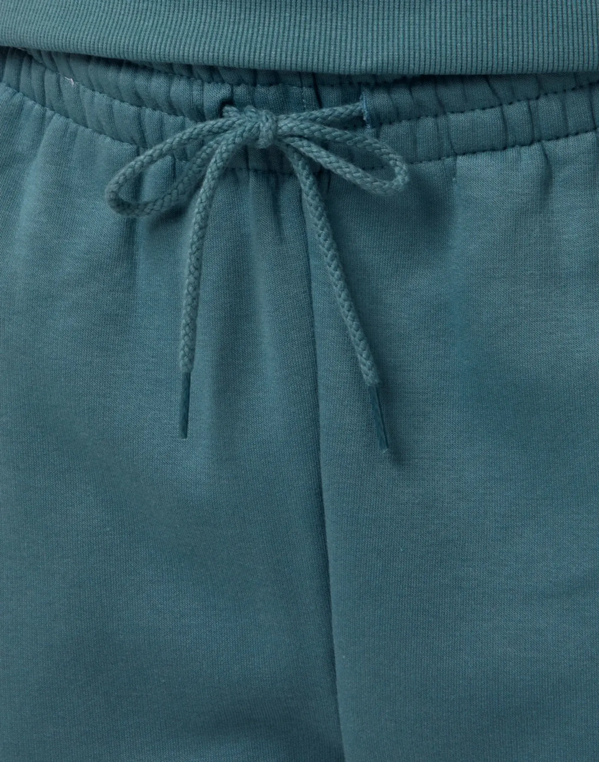 New Balance Men's Sport Essentials Fleece Jogger in Green Cotton