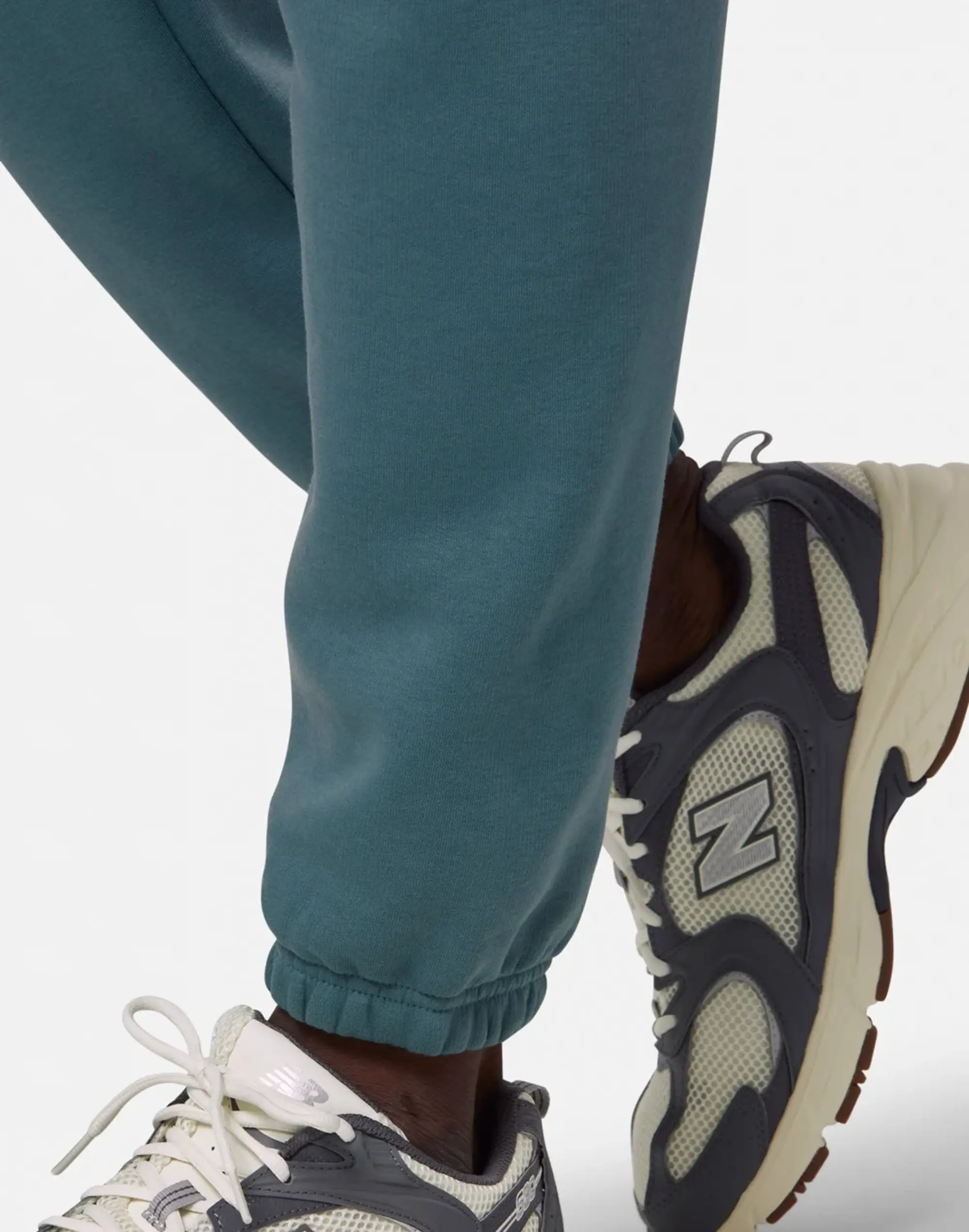 New Balance Men's Sport Essentials Fleece Jogger in Green Cotton